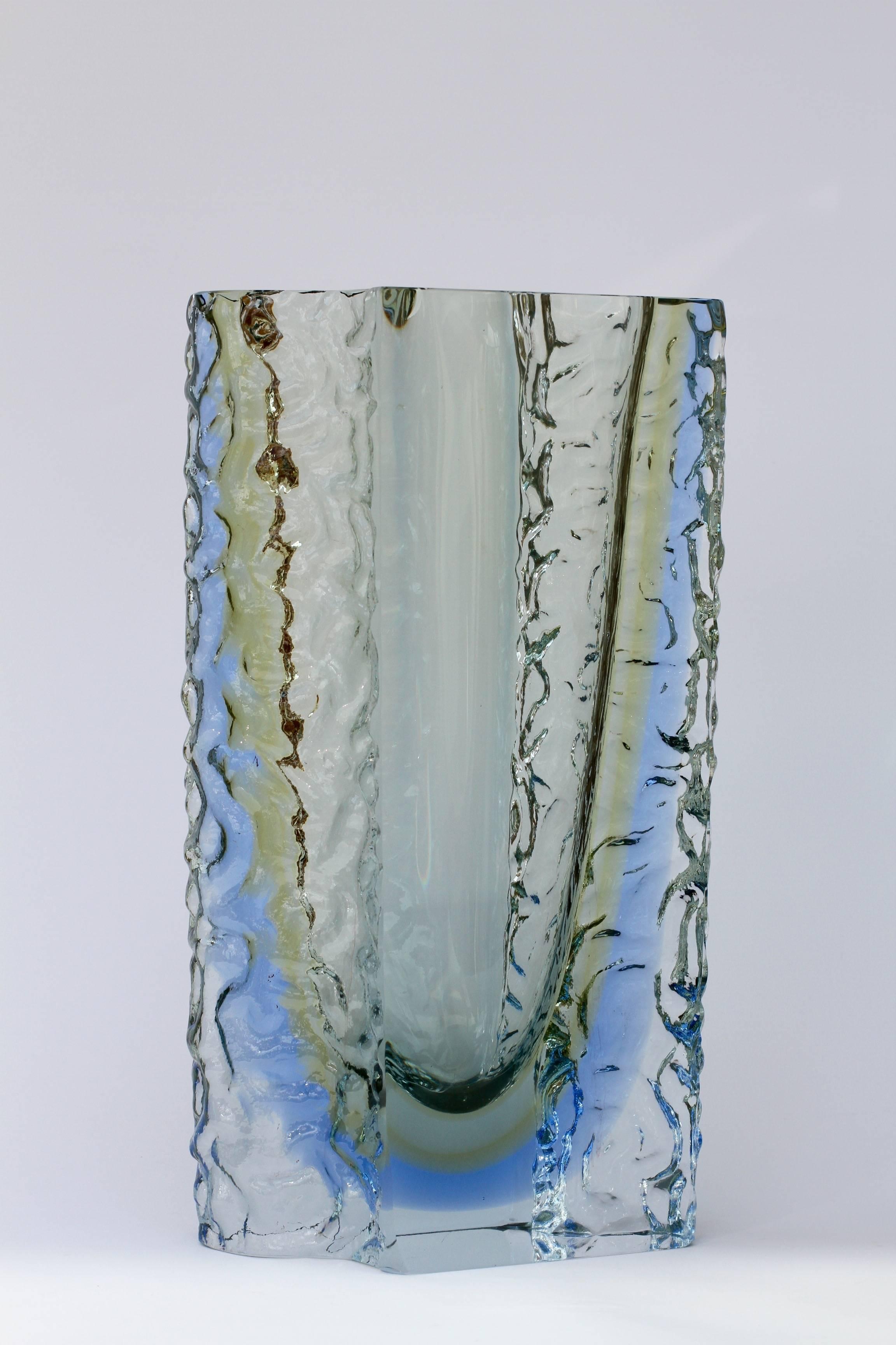 Large vintage midcentury Murano art glass vase attributed to Mandruzzato, circa 1980s. The combination of ocean blue and the textured clear 'Sommerso' ice glass is simply mesmerizing.

Stunning in every way this piece of italian art glass is a