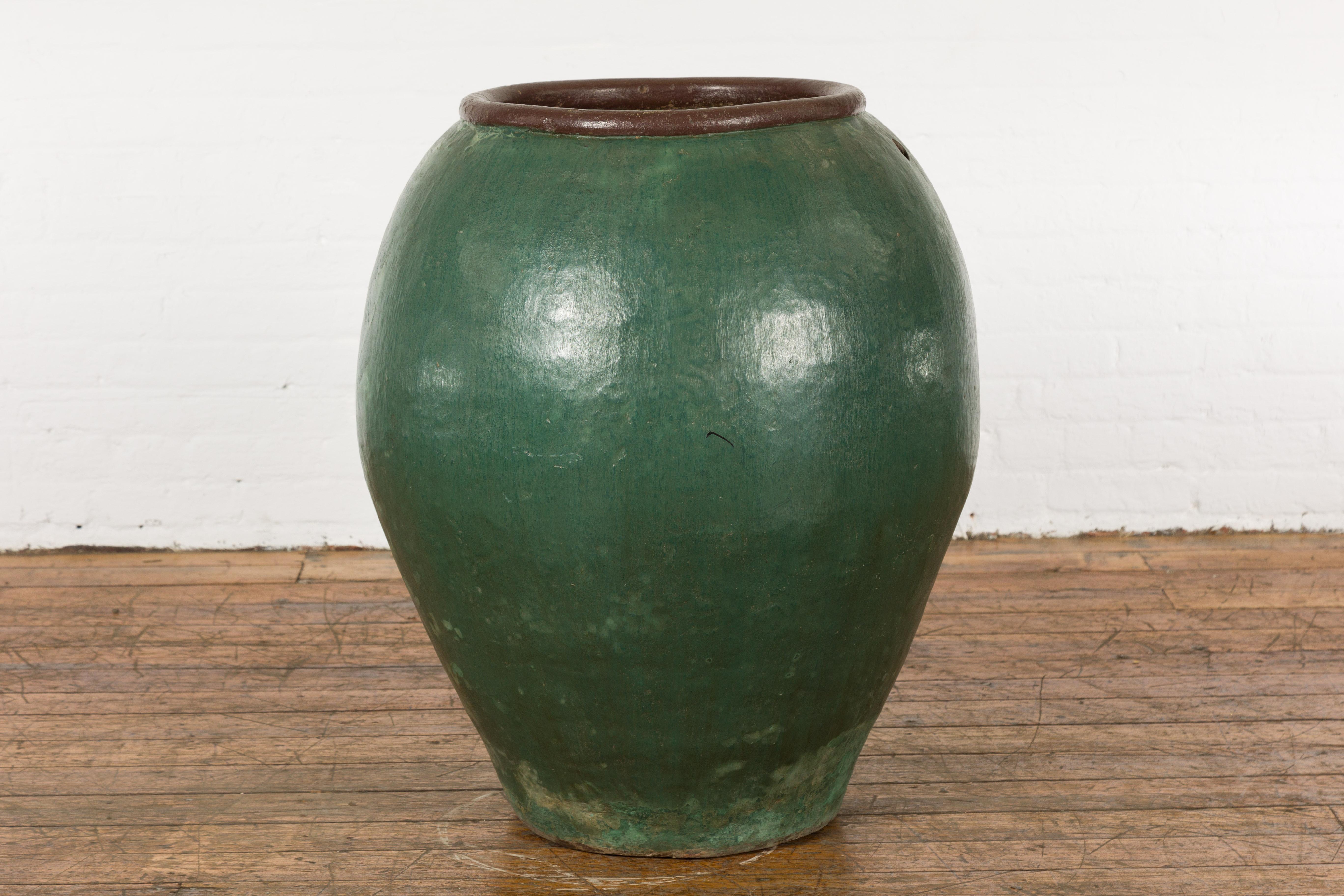 Large Thai 1950s Green Glazed Ceramic Planter with Brown Lip and Tapering Body For Sale 6