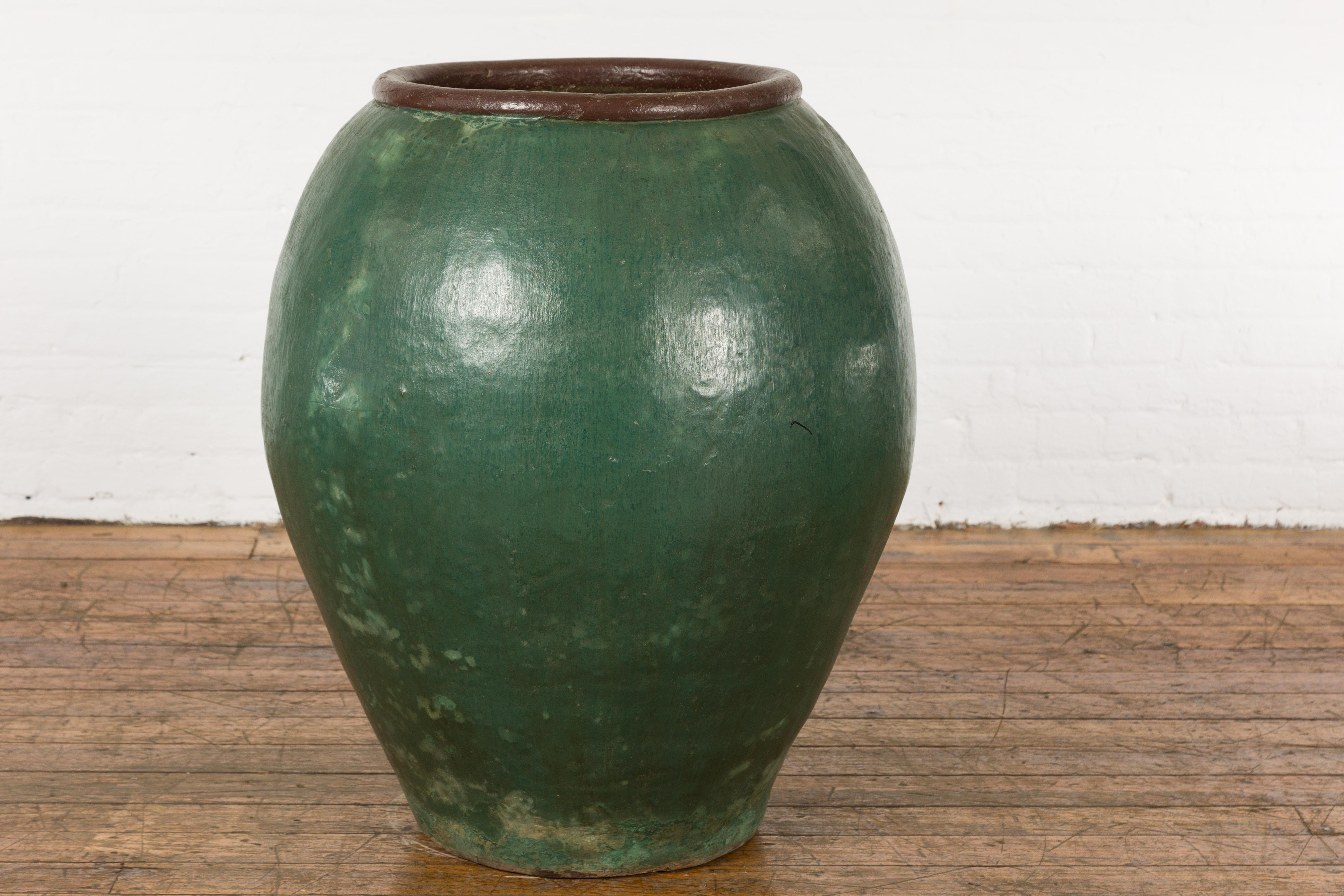 Large Thai 1950s Green Glazed Ceramic Planter with Brown Lip and Tapering Body For Sale 7