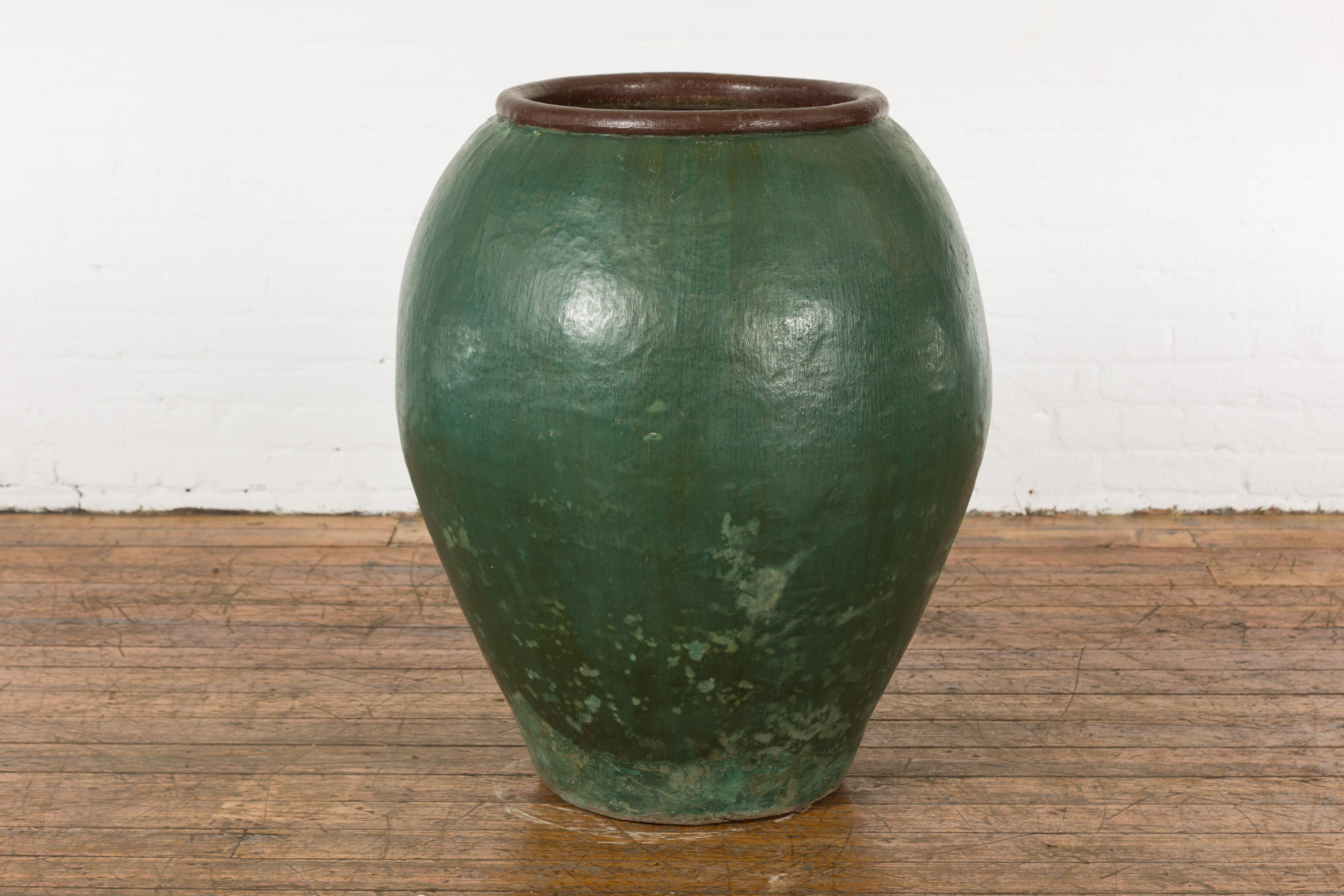 Large Thai 1950s Green Glazed Ceramic Planter with Brown Lip and Tapering Body In Good Condition For Sale In Yonkers, NY