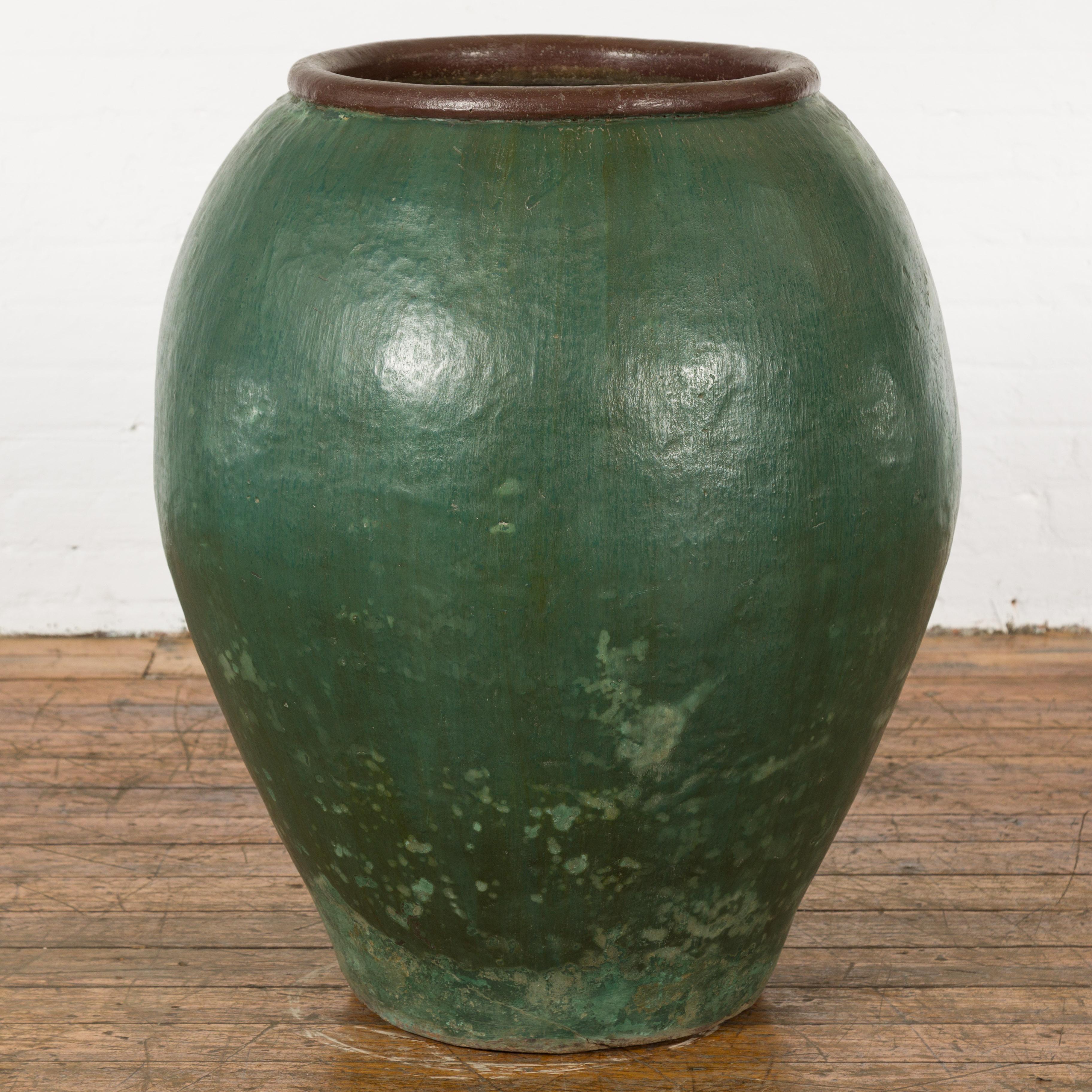 Large Thai 1950s Green Glazed Ceramic Planter with Brown Lip and Tapering Body In Good Condition For Sale In Yonkers, NY
