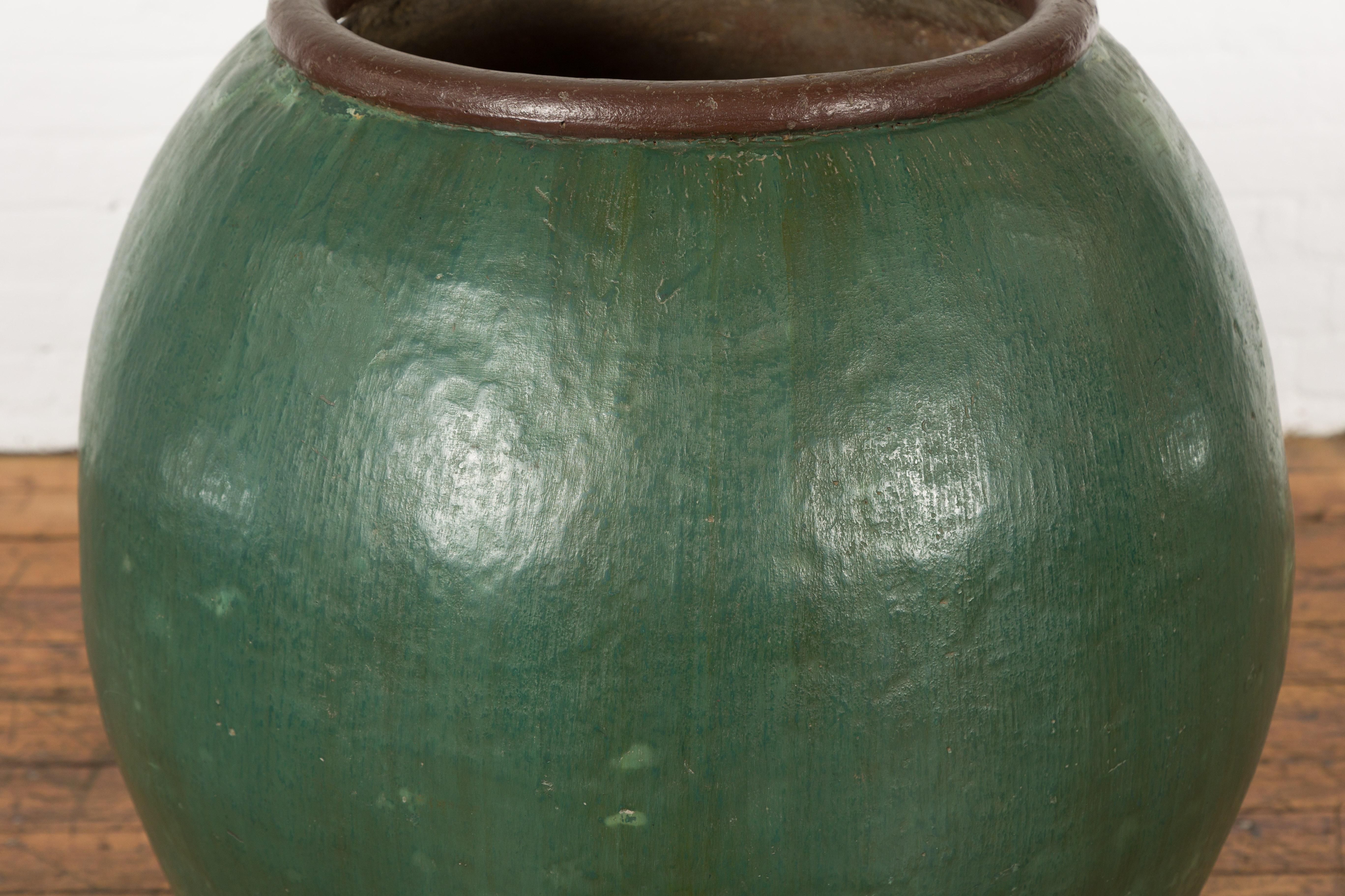 Large Thai 1950s Green Glazed Ceramic Planter with Brown Lip and Tapering Body For Sale 1
