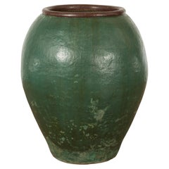 Antique Large Thai 1950s Green Glazed Ceramic Planter with Brown Lip and Tapering Body