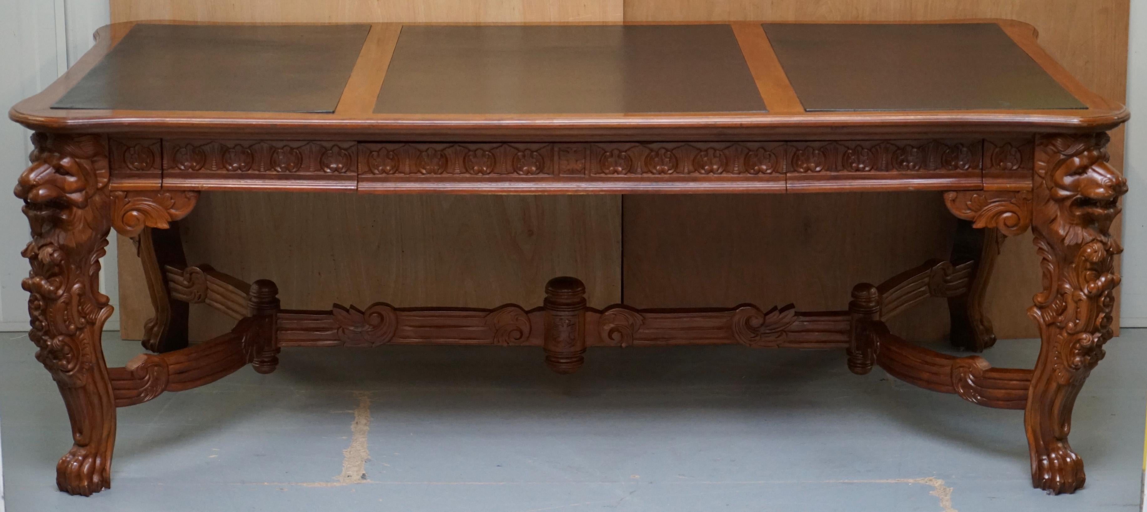We are delighted to offer for sale this stunning “The Raffles Lion Table” with carved wood Lion head legs and three drawers

A very decorative and multifunctional piece, designed as a Library writing table or three drawer desk, it's actually large