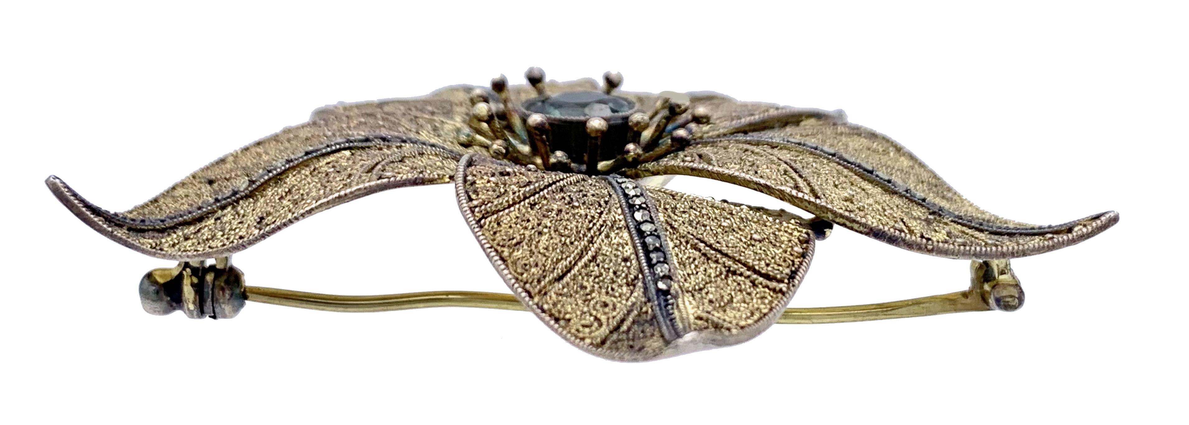 a brooch is made with silver wire