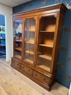 Large three door English bookcase from Wilkinson & Son