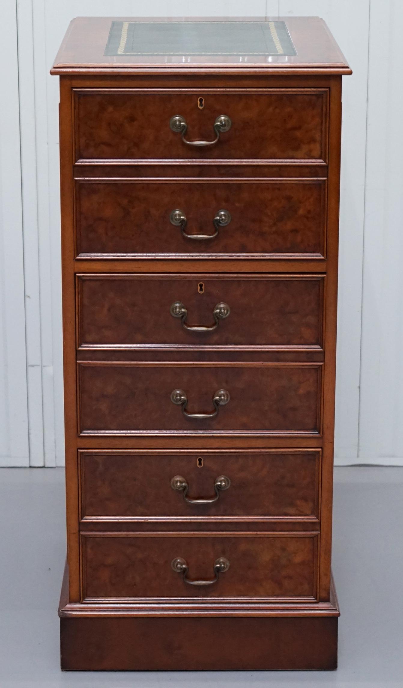We are delighted to offer for sale this lovely large Burr Walnut with green leather gold tooled writing surface three drawer filing cabinet 

The green leather writing surface is gold tooled and it has a nice vintage patina to it as does the burr