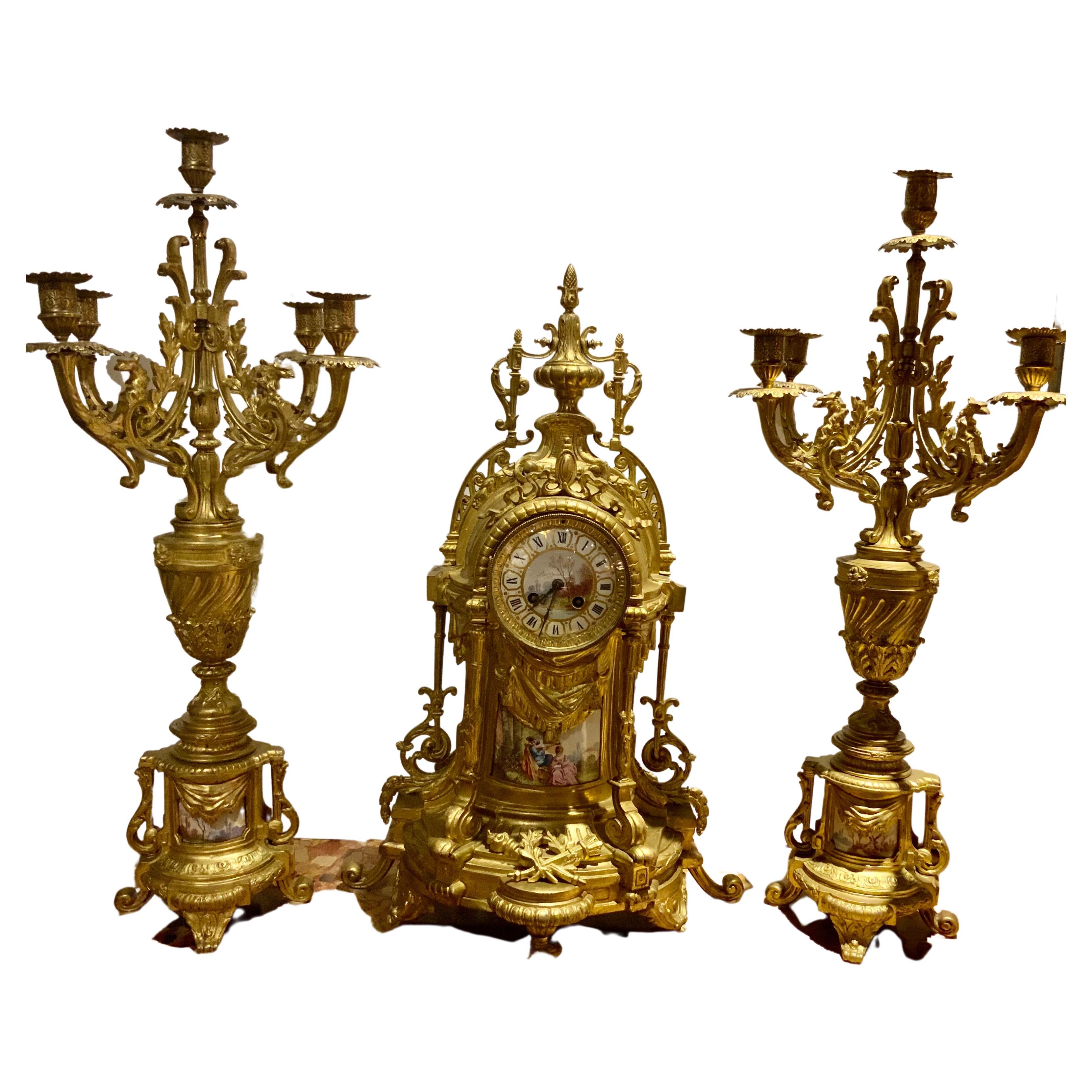 Grand ensemble horloge/garniture français du XIXe siècle en trois pièces de style Louis XVI en vente