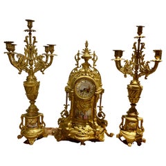Grand ensemble horloge/garniture français du XIXe siècle en trois pièces de style Louis XVI