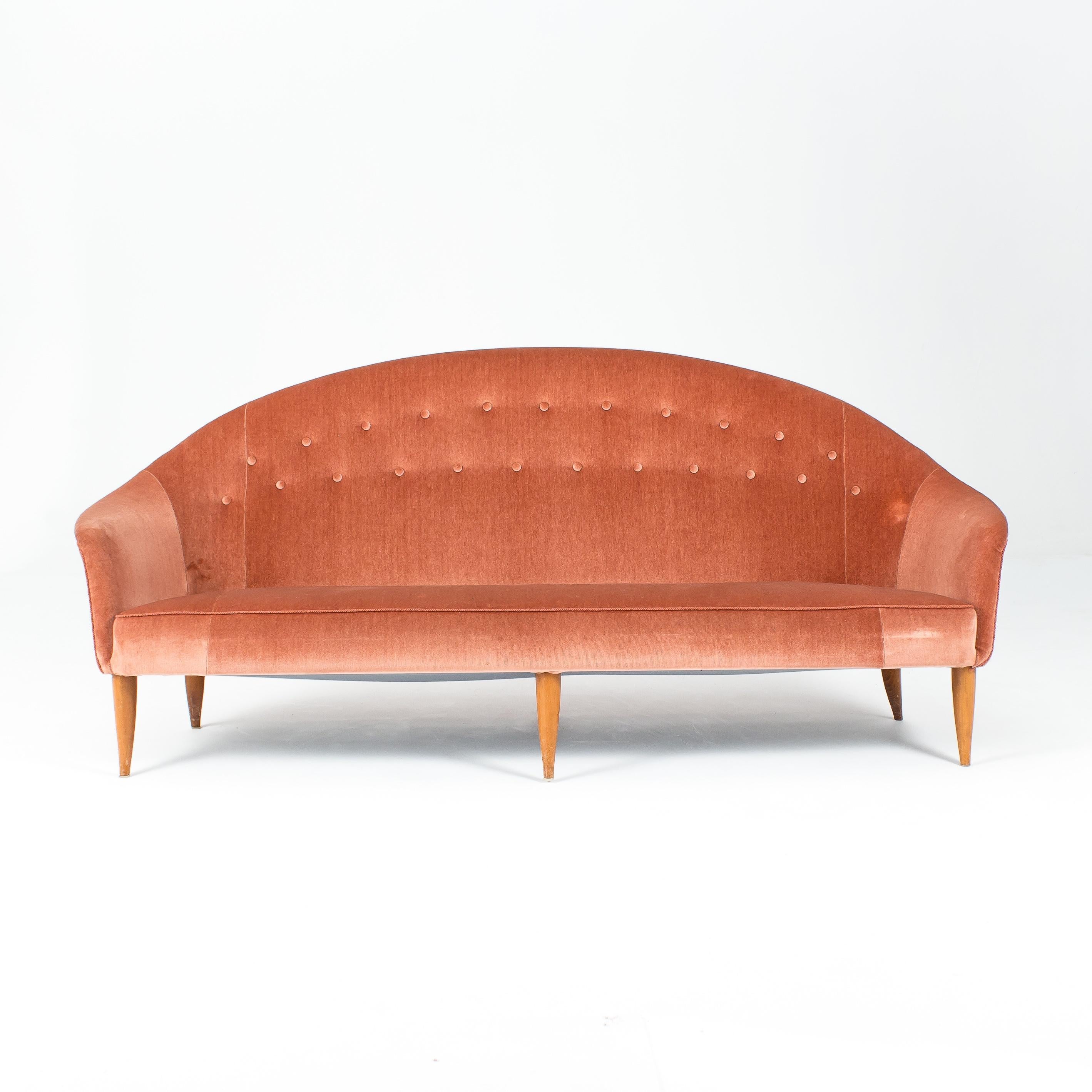 A large three-seat 'Paradise' sofa in its original pink mohair velvet upholstery.

Designed for Nordiska Kompaniet. 

Sweden, circa 1960s.