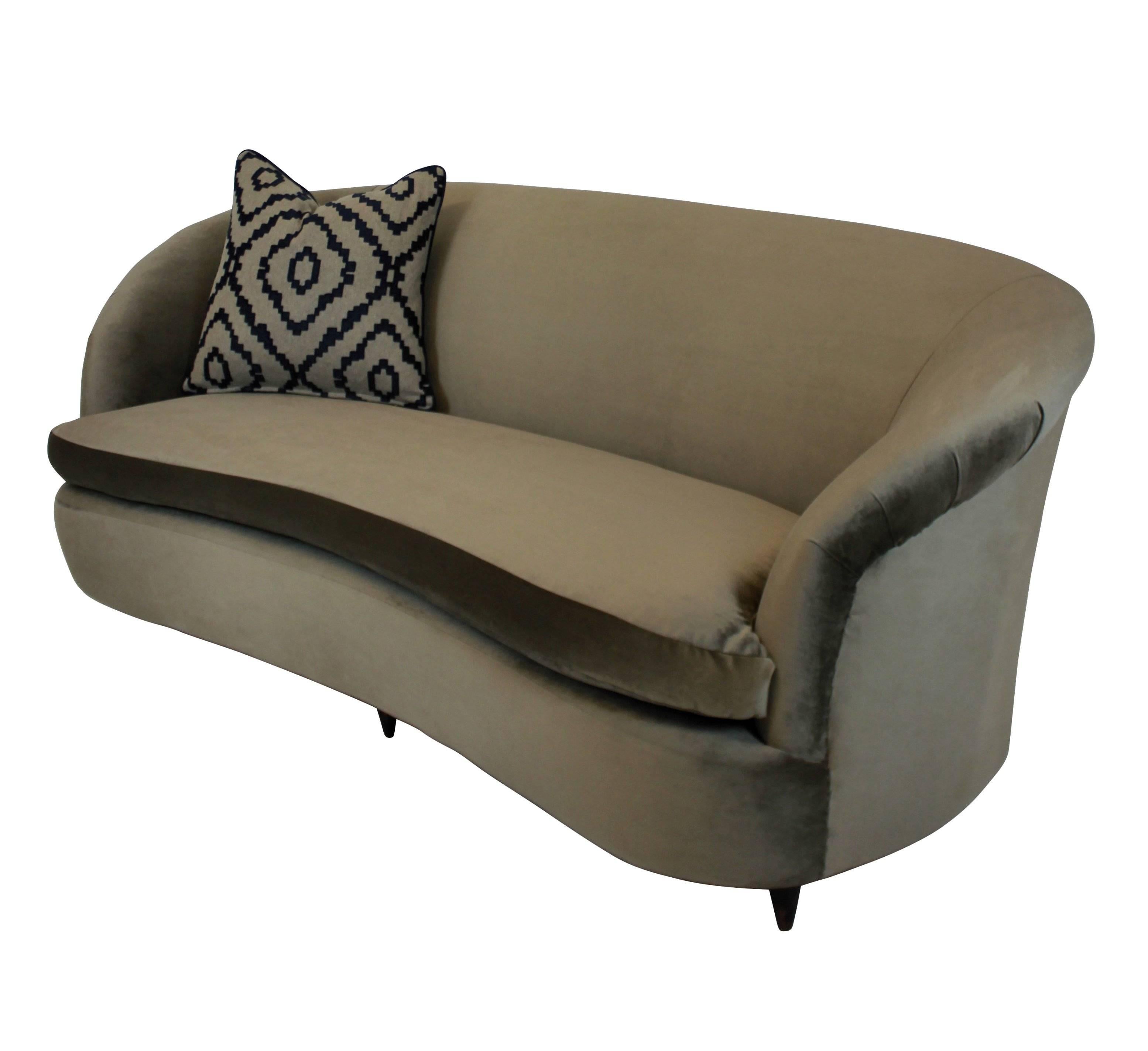A large three-seat, extremely comfortable sculptural settee by Parisi, with swab cushion and newly upholstered in mole velvet.

