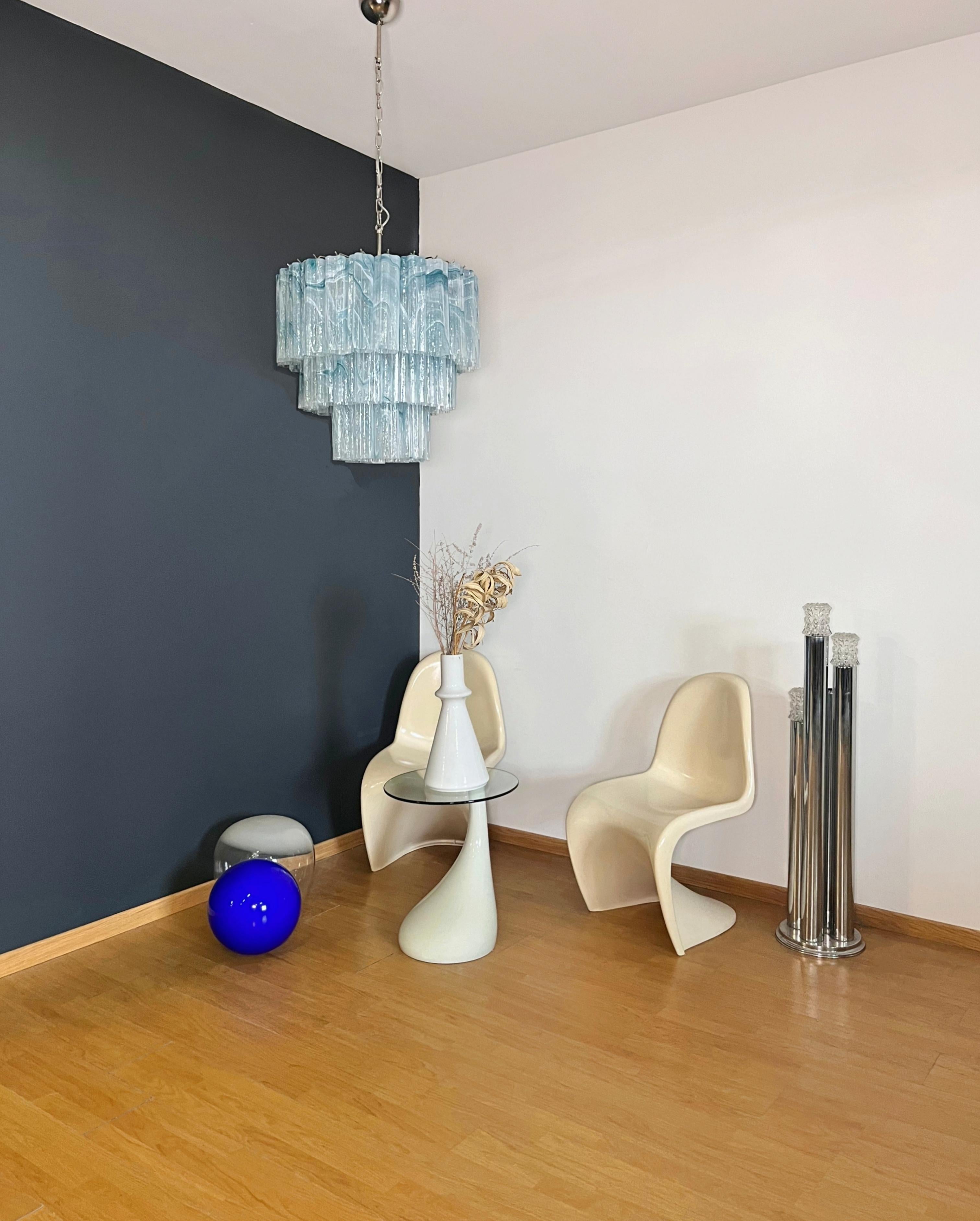 Italian vintage chandelier in Murano glass and nickel-plated metal structure.The armor polished nickel supports 101 large blue alabaster glass tubes in a star shape. The alabaster technique created in Venetian glassworks gives the glass an elegant