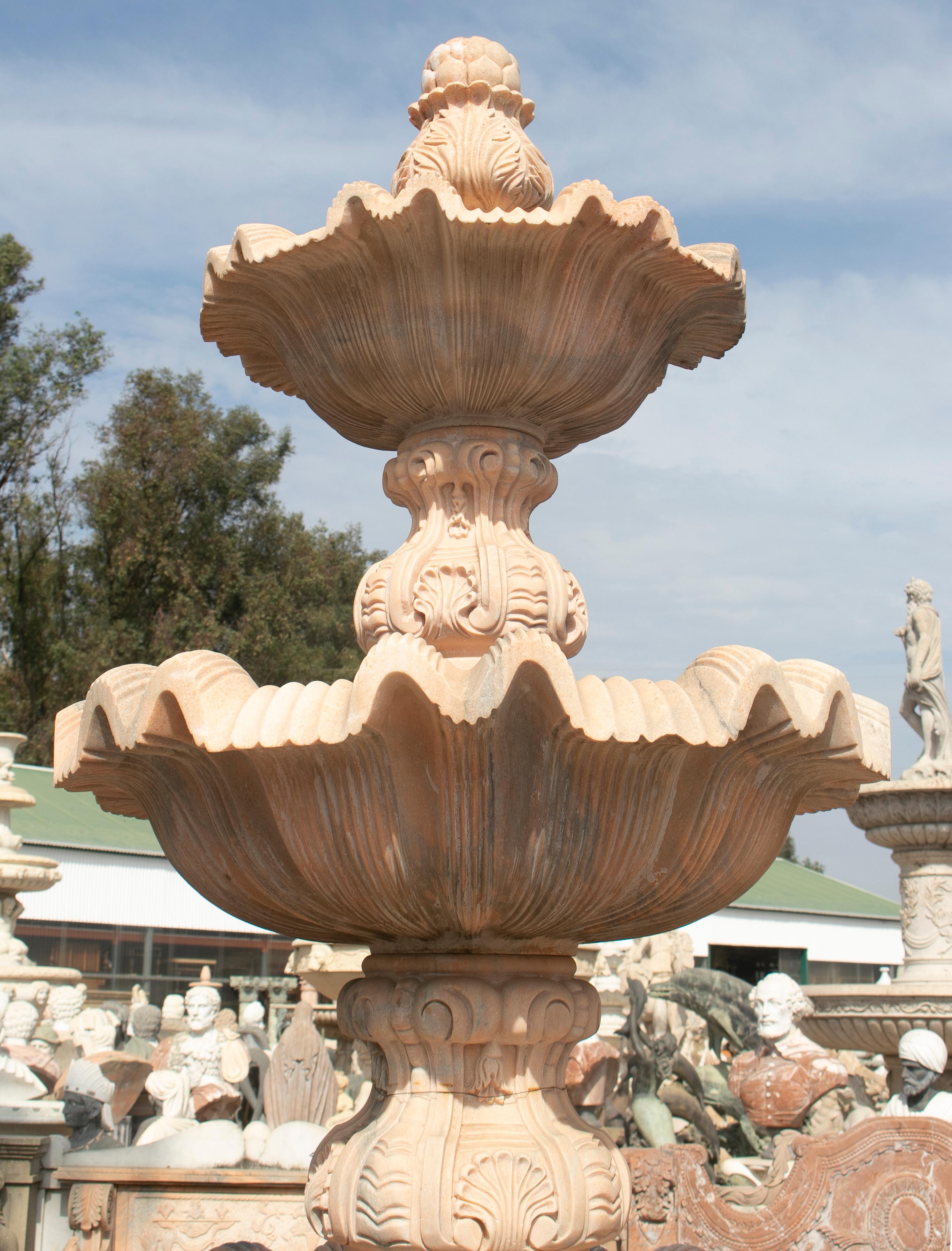 Large three-tier Portuguese Rosa marble ornamental fountain over 3m tall.

It is the largest in its category, 3-tier marble fountains, with the most elaborate ornamental decorations.

We hand carve to order.