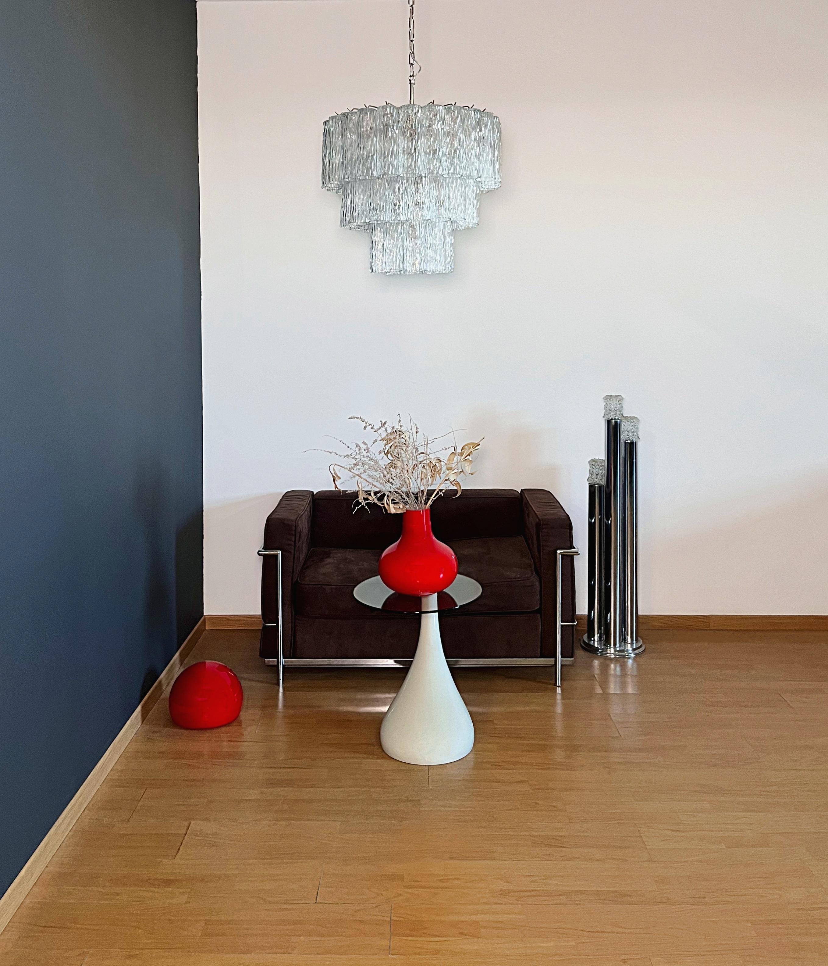 Italian vintage chandelier in Murano glass and nickel-plated metal structure. The polisched nikel armature supports 52 large clear glass tubes which have a slightly textured effect to create an impressive 