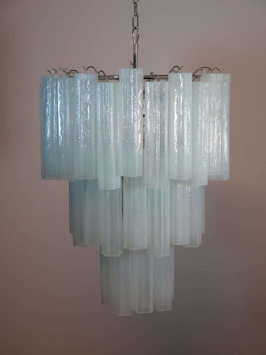 Italian vintage chandelier in Murano glass and nickel-plated metal structure. The armor polished nickel supports 48 large opal silk glass tubes in a star shape. The glasses have a beautiful color, object of rare beauty.
Period:	1980's
Dimensions: 59