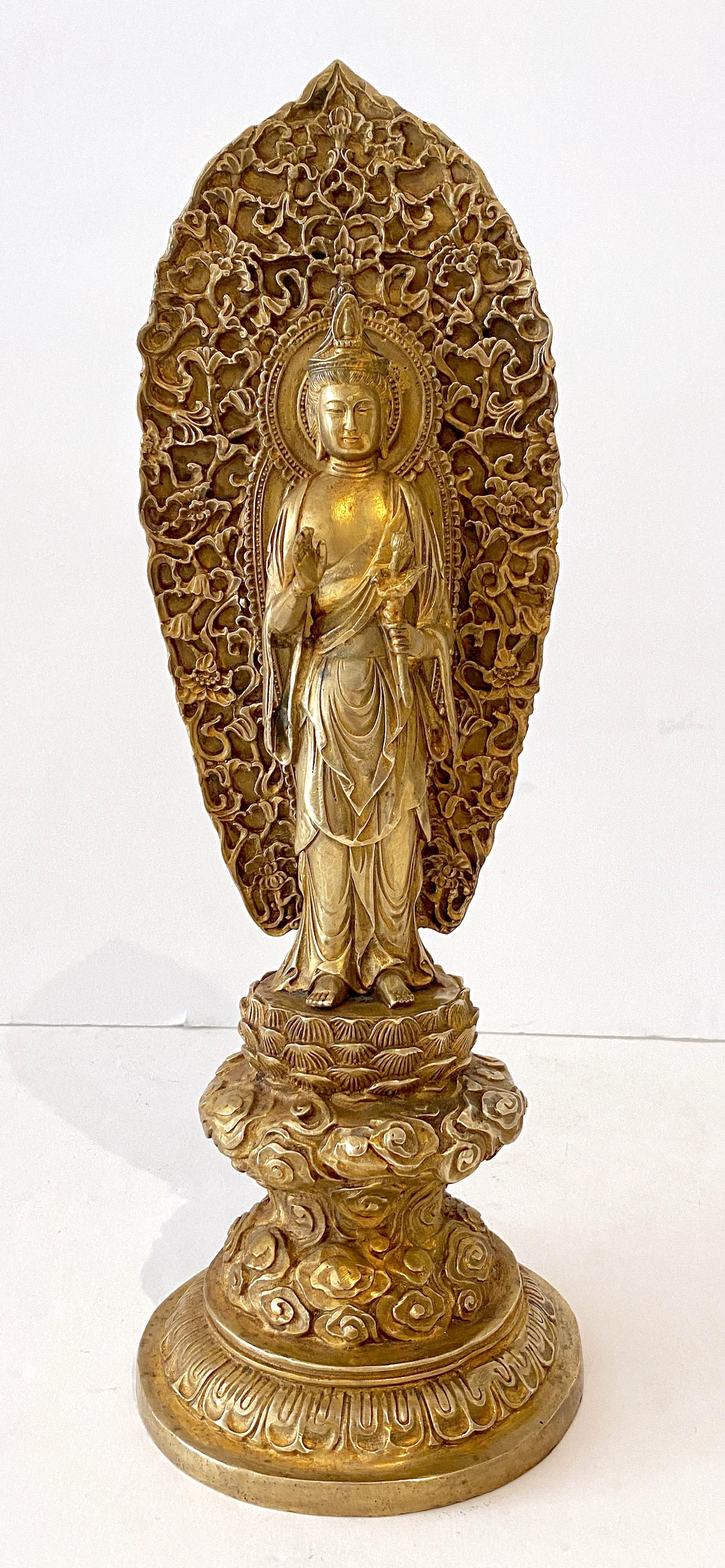 Cast Large Tibetan Gilt Bronze Standing Buddha with Halo  