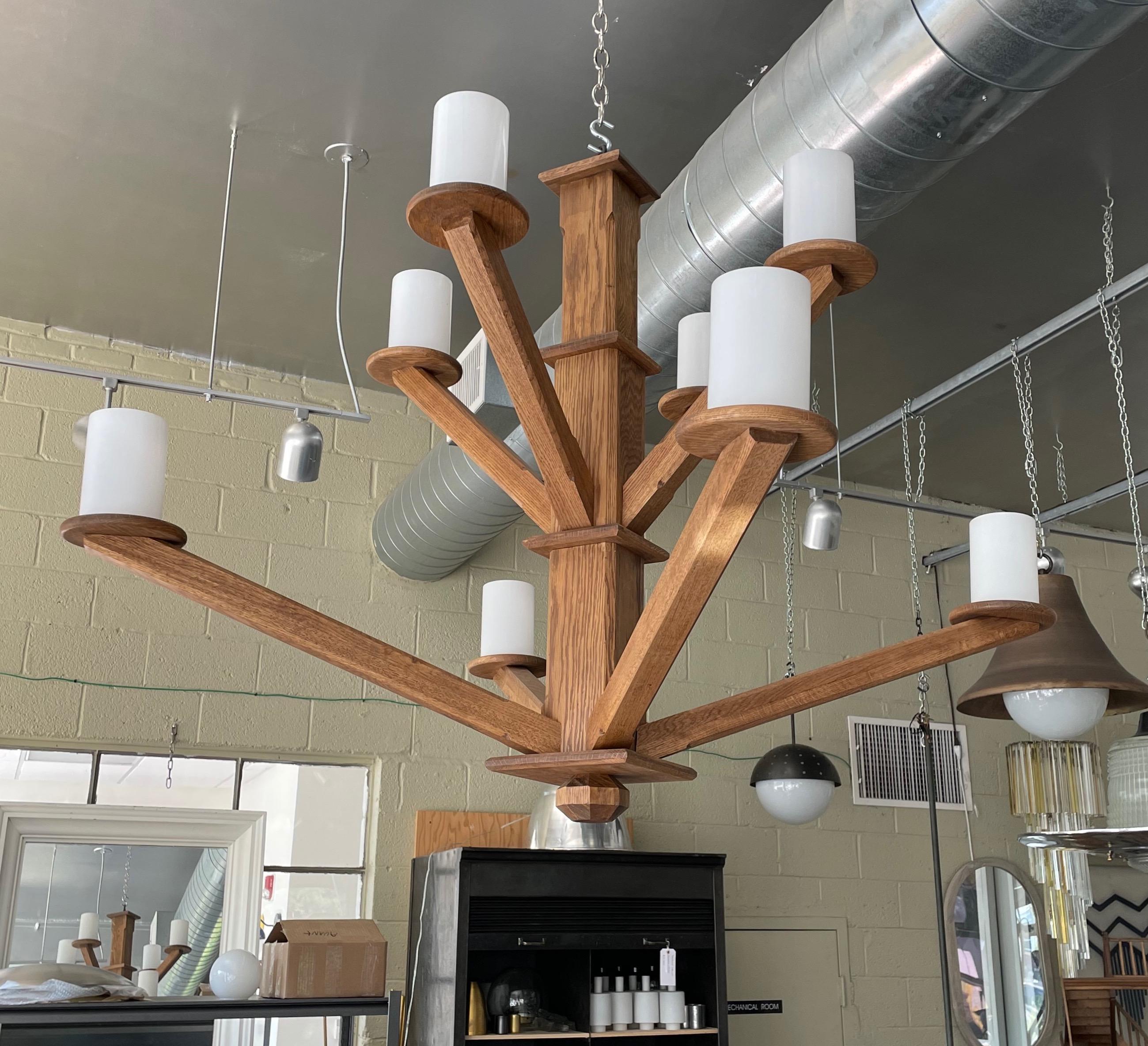 Hand crafted custom made large tiered solid oak wood chandelier. Chandelier is 40