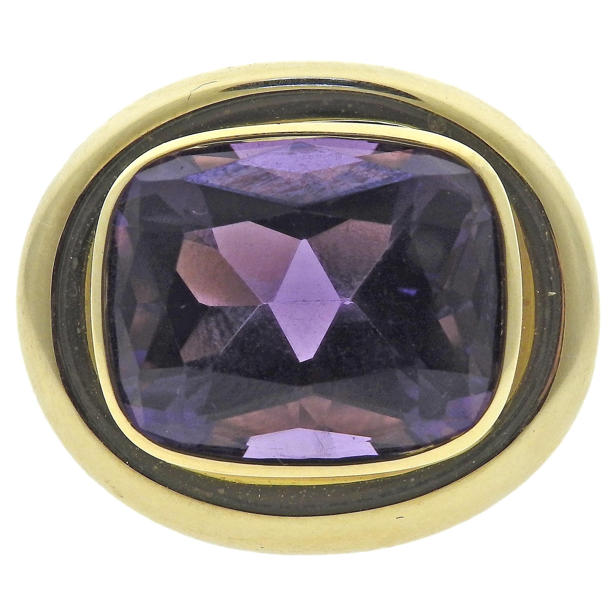 Tiffany & Co by Paloma Picasso 18k yellow gold large 18.5mm x 16.5mm amethyst ring. Ring size is 6.5, top measures 27mm x 24mm. Marked: Tiffany & Co, 750, Paloma Picasso. Weight is 29.2 grams.