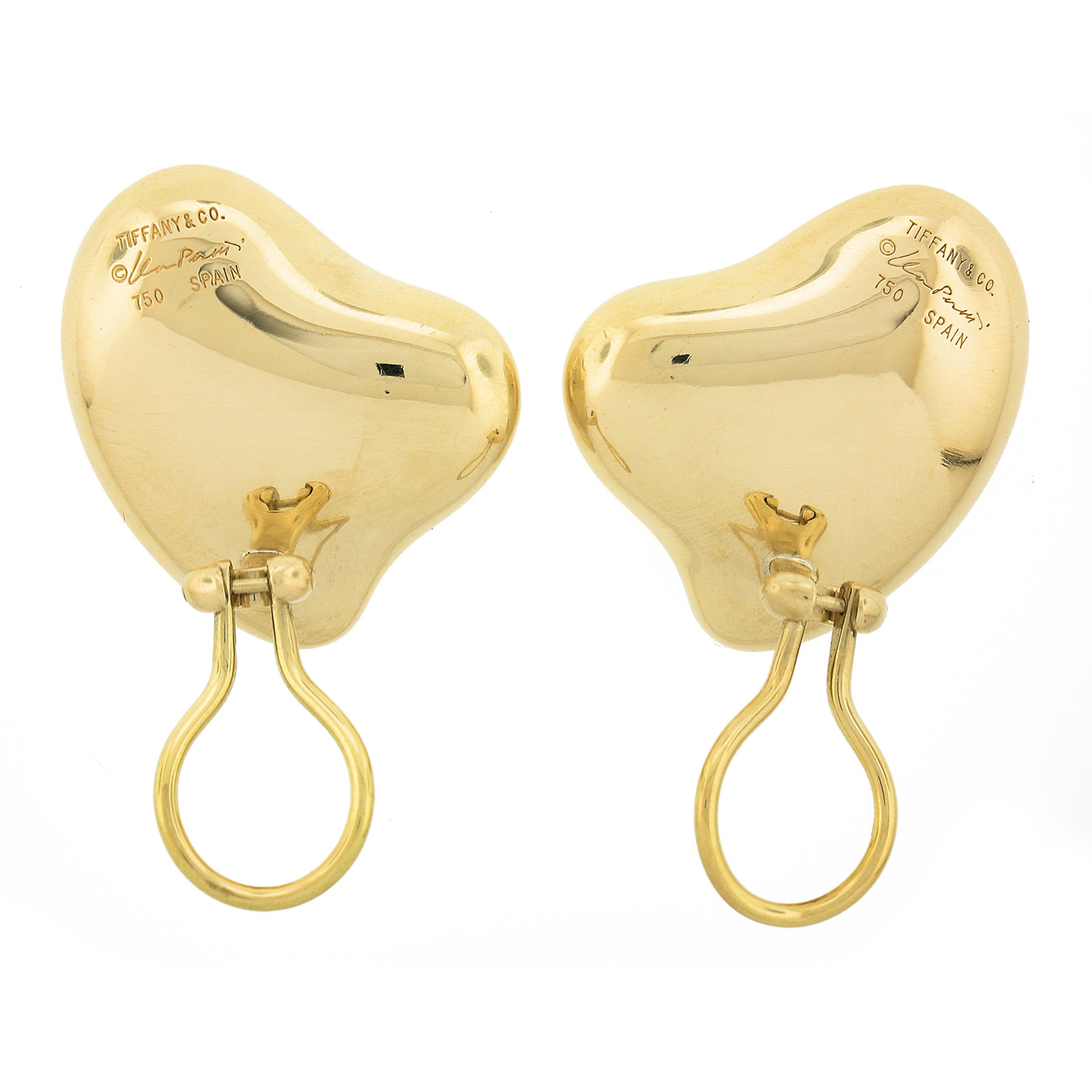 Large Tiffany & Co. Peretti 18k Gold Full Heart Polished Clip on Earrings In Good Condition In Montclair, NJ
