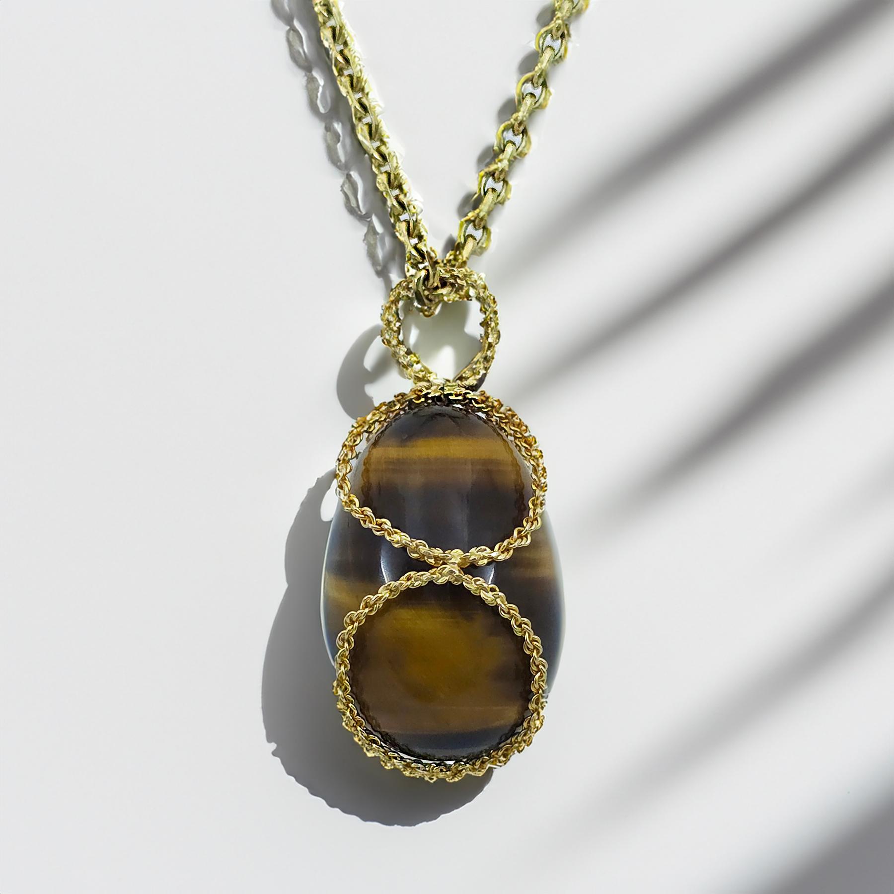 Large Tiger's Eye and 18k Gold Encased Egg Pendant  In Excellent Condition In New York, NY