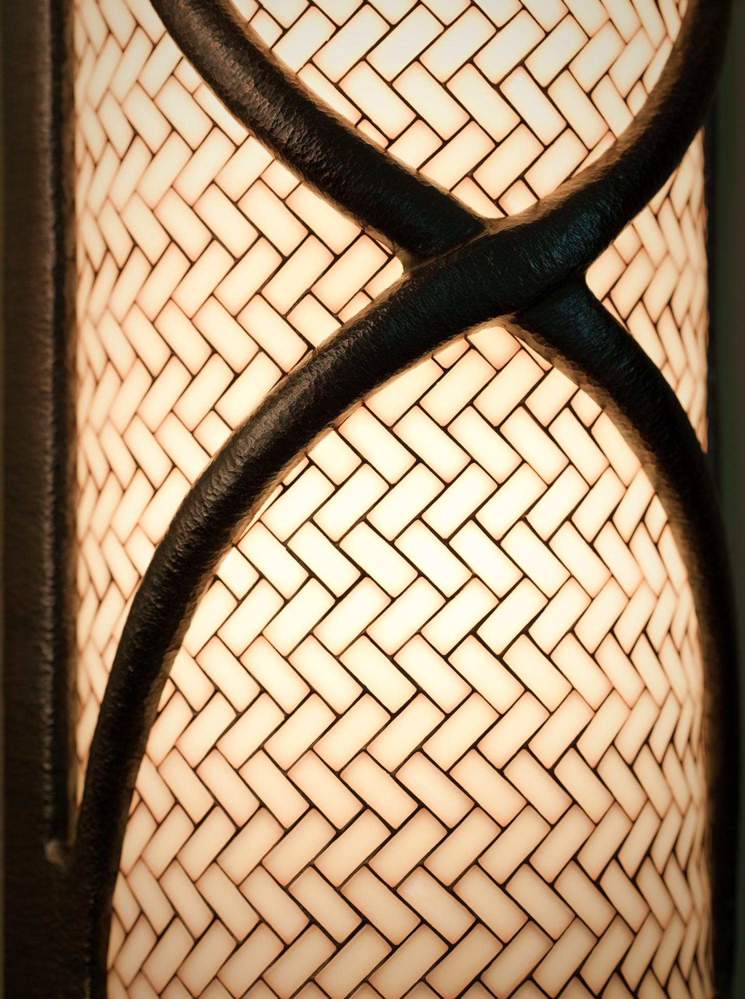 We believe that fine lighting fixtures should be timeless in style and in materials.
By using glass and bronze we can ensure that our fixtures become heirlooms of our next generation. The Tiled Ribbon Sconce is crafted from our kiln cooked tiles