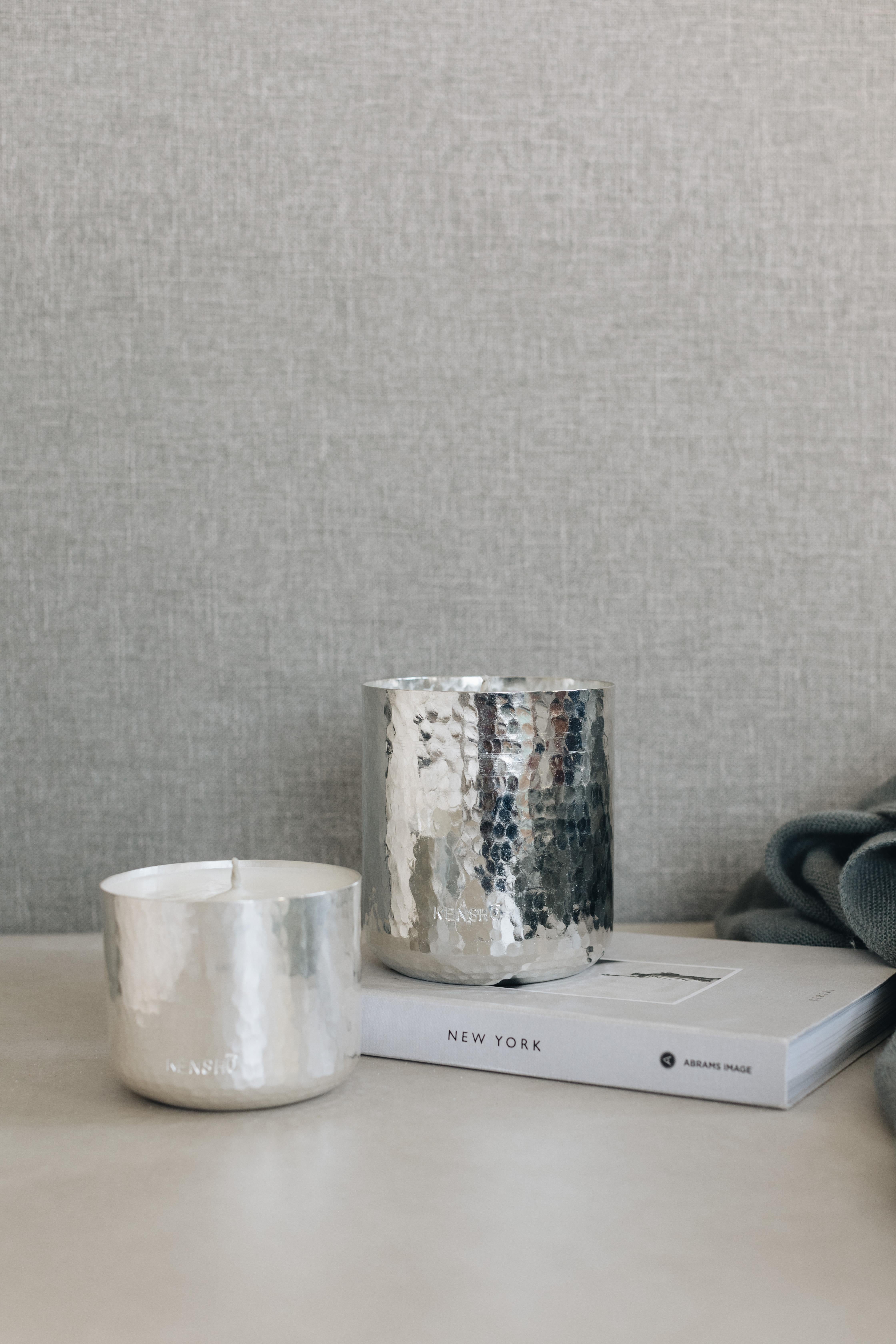 This stunning soy wax candle, crafted by skilled Mexican artisans, is a true work of art. The vase is made of hand-hammered copper with tin which gives it this silver color. It has an earthy, natural feel that fits perfectly with any home decor.