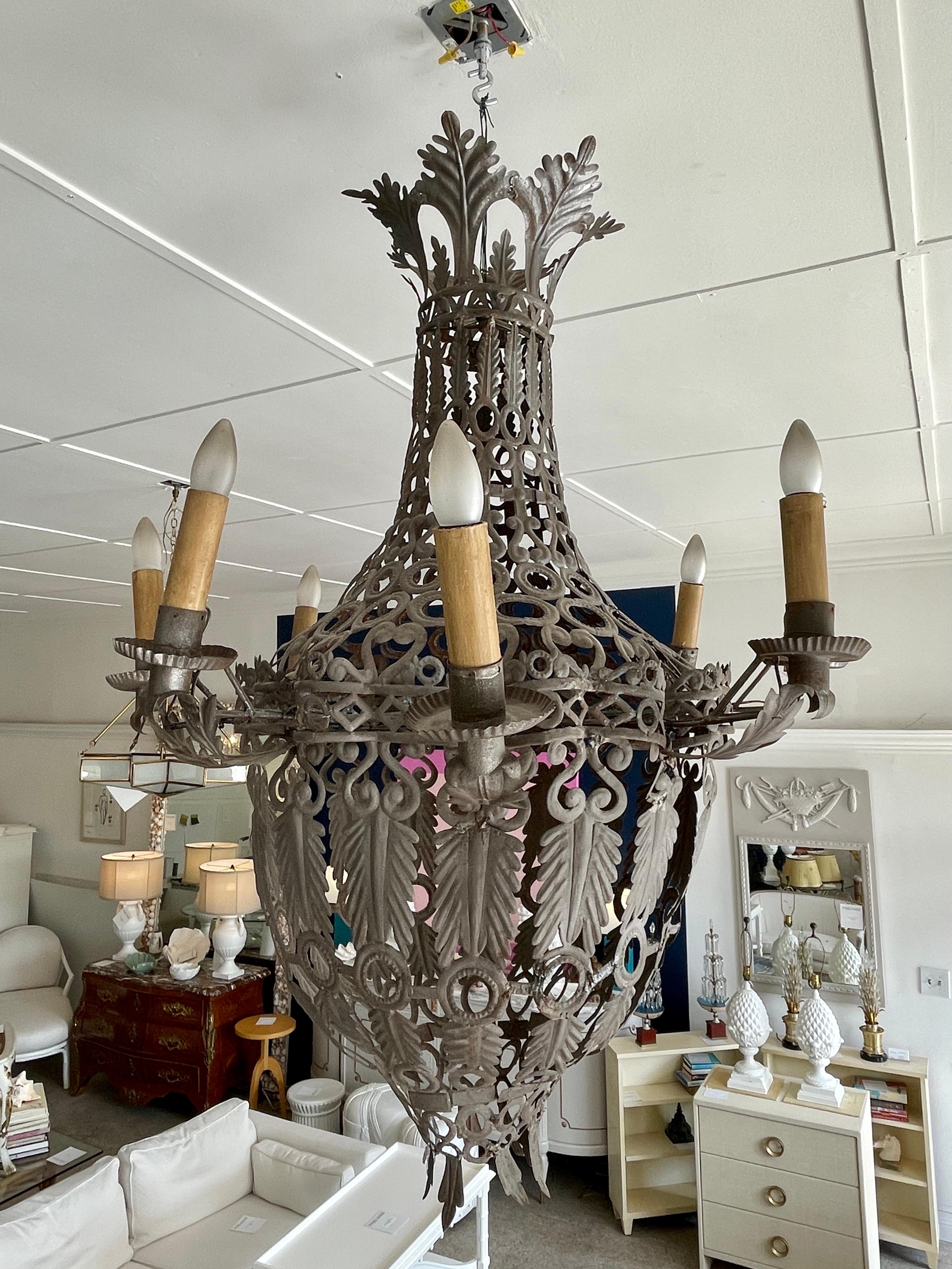 Extremely rare oversized French Tole Ceilling fixture. Incredible detail and extremely delicate at the same time. Add some French Style too your home.