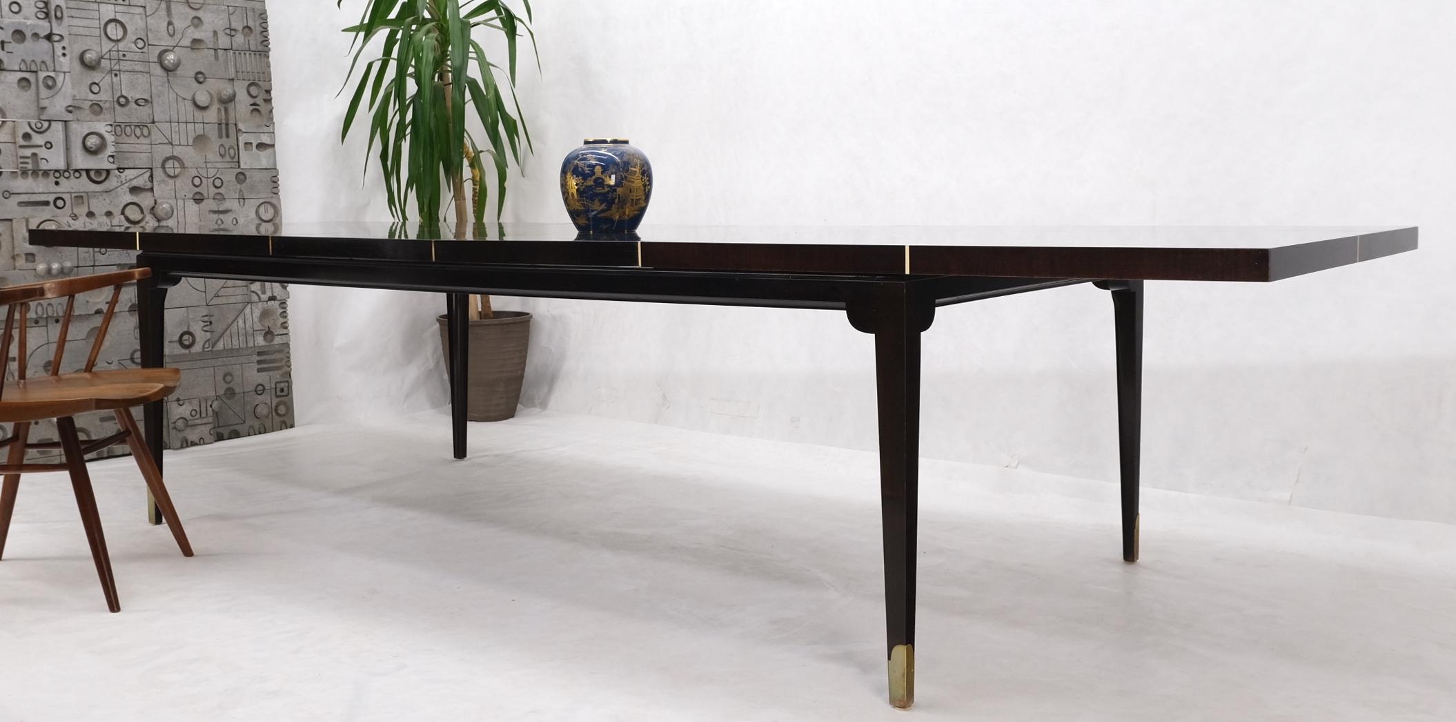 Mid-Century Modern Large Tommi Parzinger Lacquered Mahogany Brass Feet Tapered Legs Dining Table For Sale