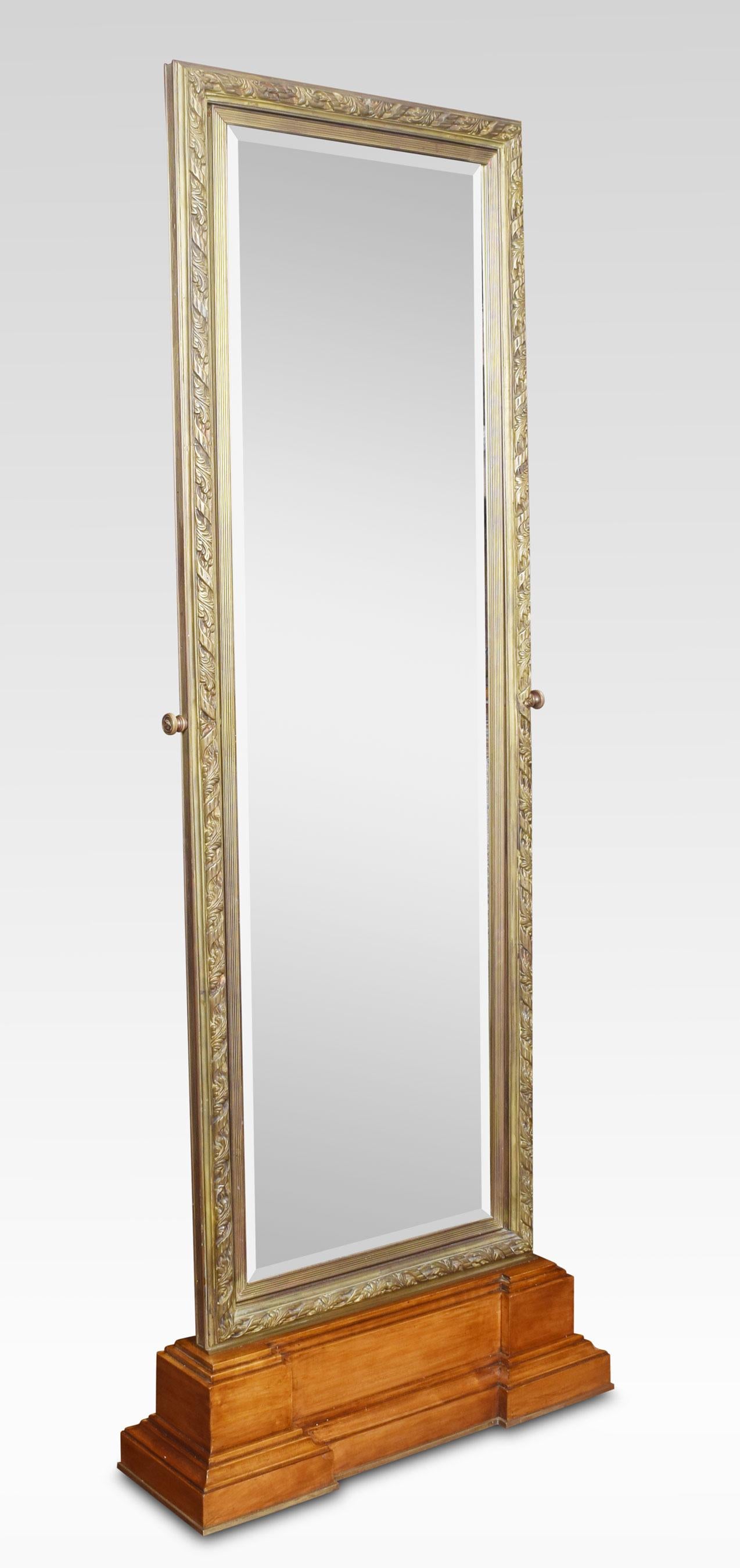 Large tooled bronze framed two-sided cheval mirror, the rectangular tooled frame enclosing the original adjustable double plate mirror. The stepped walnut base.
Dimensions
Height 77.5 inches
Width 30 inches
Depth 9 inches.