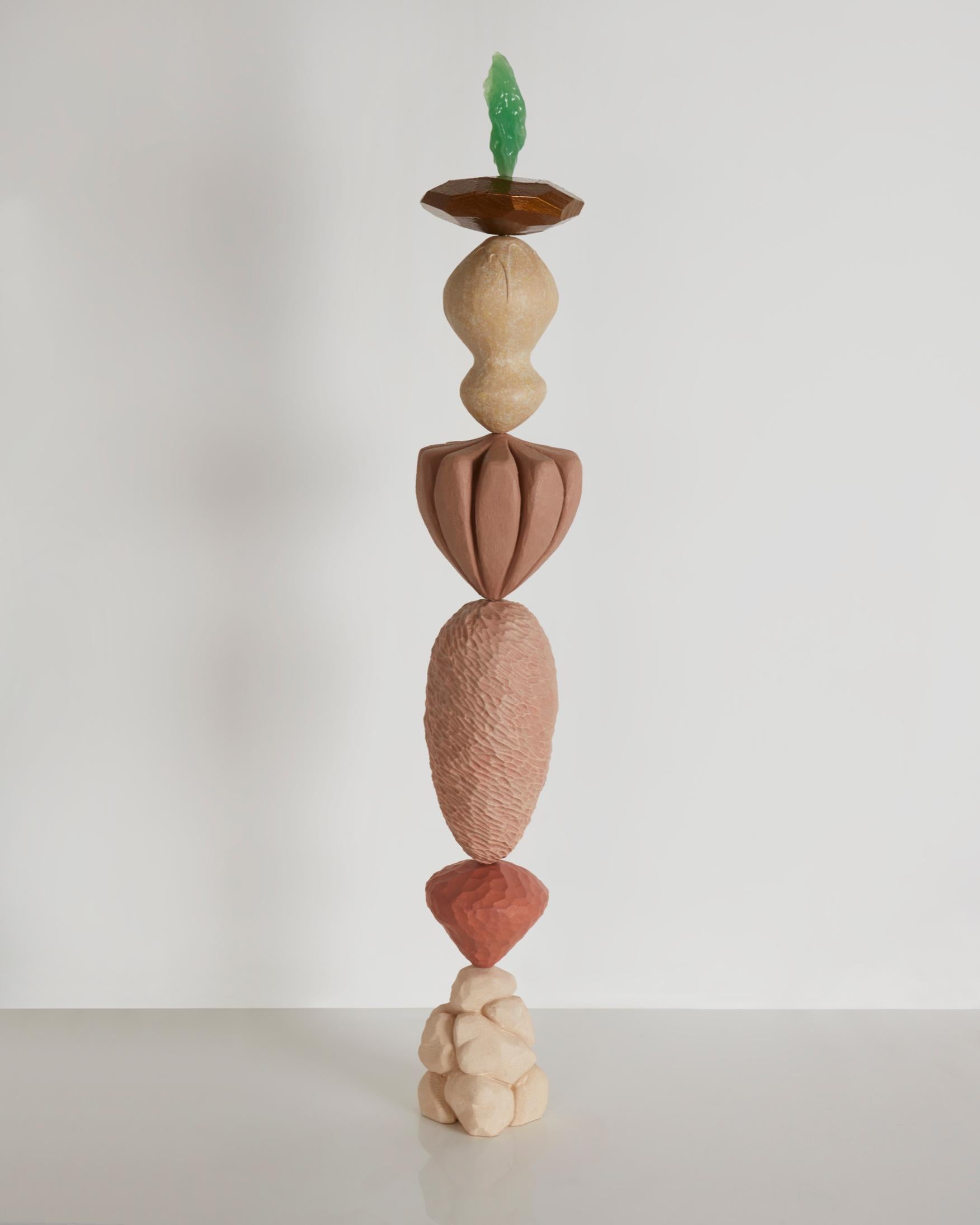 Two hand-sculpted epoxy resin forms on a stainless steel rods with hand carved sandstone bases. 
