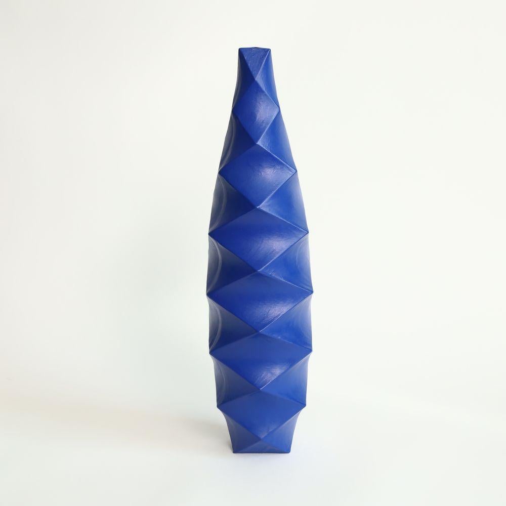 Large Tower in Cobalt
The Large Tower is a stunning piece of contemporary art that exudes an air of sophistication and elegance. Its towering form, which rises up to an impressive height, commands attention and inspires awe.
One of the most striking