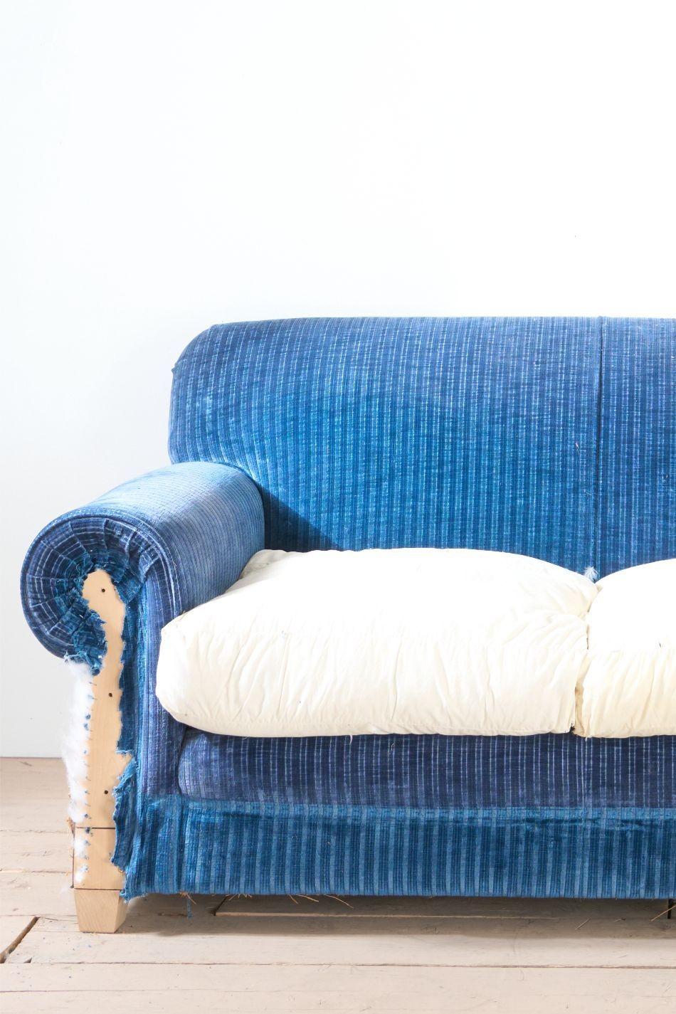 This is a very elegant 20th century country house sofa. Traditionally made and stunning design that will sit well in any interior. Standing on squat tapered beech legs and complete with full feather seat cushions that make this extremely
