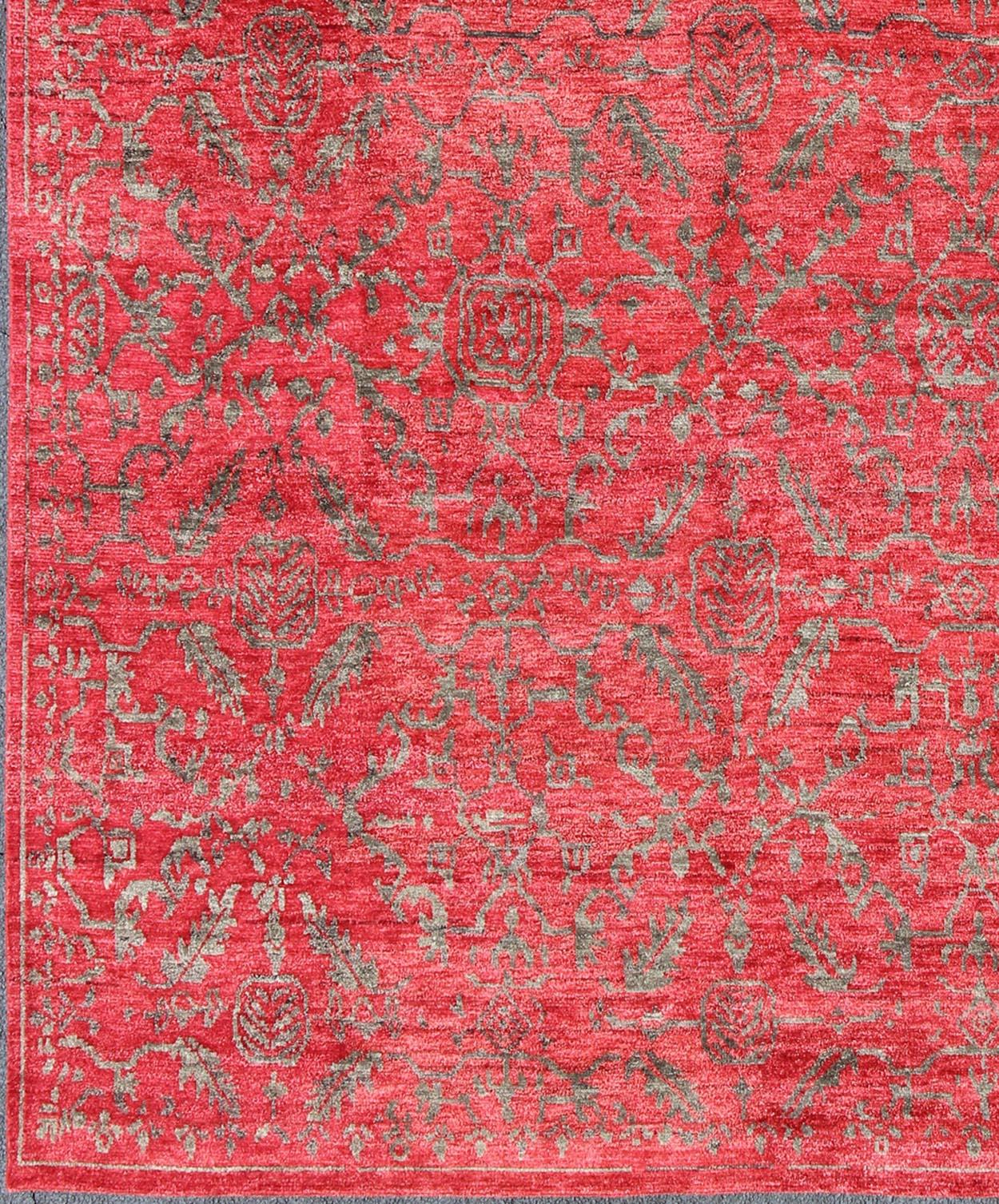 This hand knotted transitional design rug features a beautiful geometric all-over design rendered in shades of red background. This piece fits well in a modern or transitional interior.

Measures: 10'0'' x 14'0''.

Large modern rug