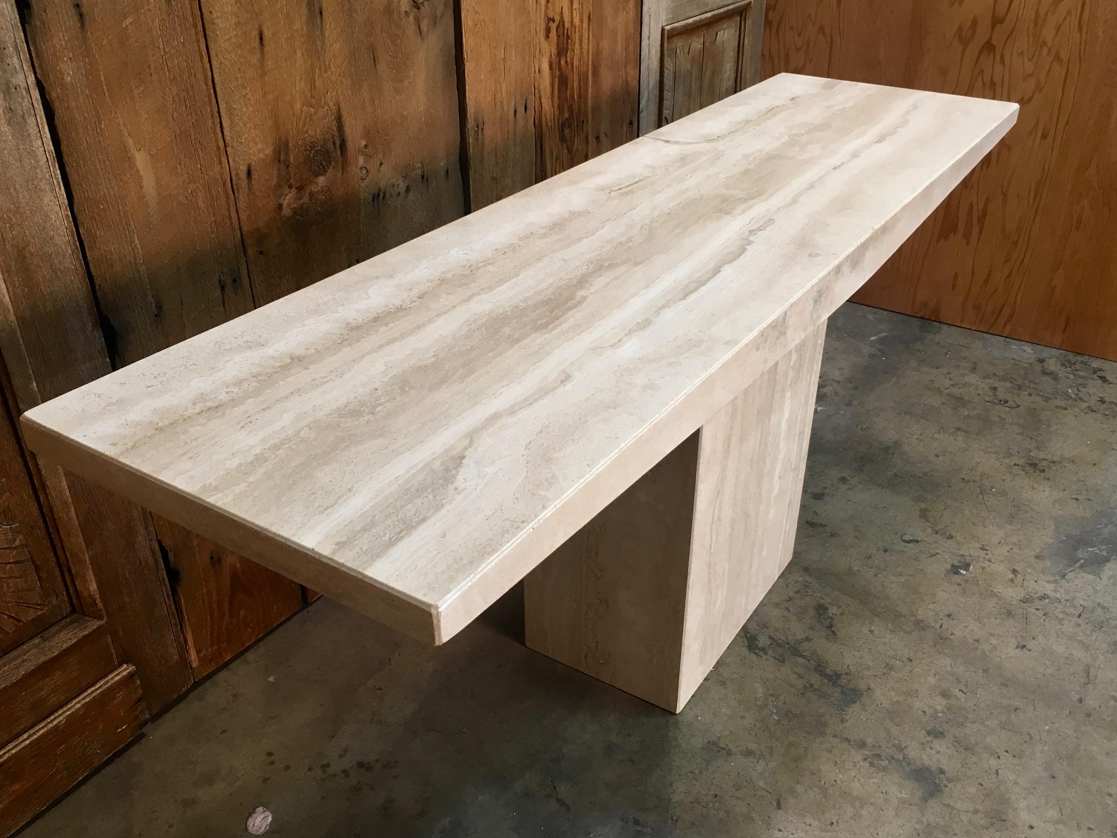 Long Travertine marble console or sofa table this model was used as a buffet in the dining room.
