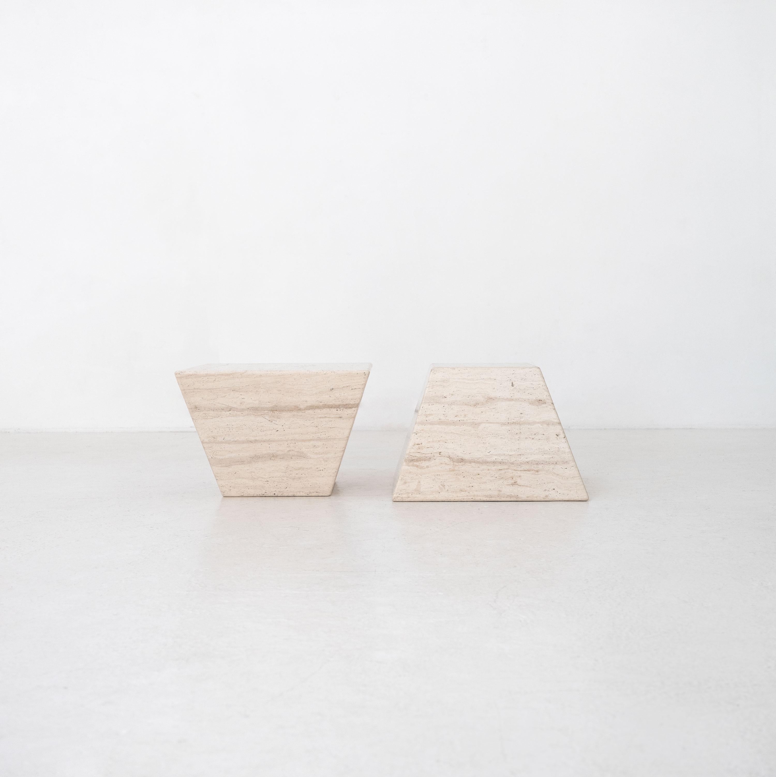 Two large frustum shaped travertine tables, Italy, c.1970.