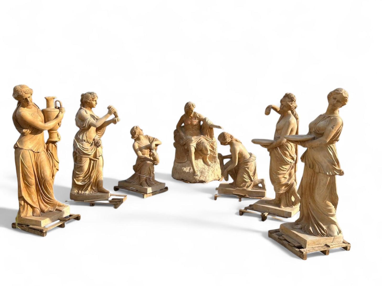 Remarkable sculptural group composed of seven hand-carved statues in travertine marble, representing The Bath of Apollo. This Italian work, likely created in the mid-to-late 20th century, captures a mythological moment with a harmonious composition