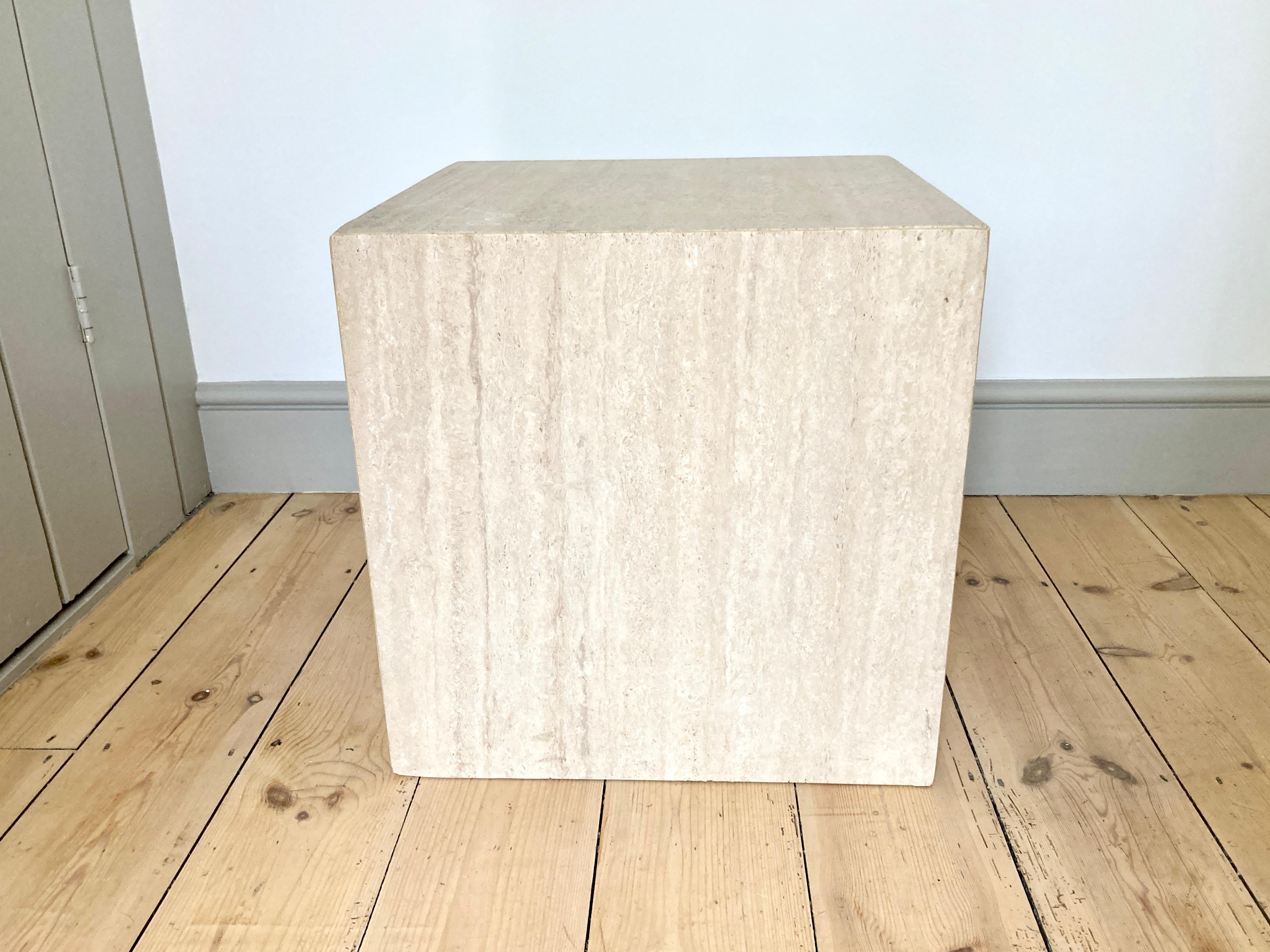 Large cube side table in a semi matt, mid to light tone travertine stone. 
 
Natural colour variation. 

Excellent condition with only very light signs of use, stains scratches or marks. Slight nibbling at the bottom back edge (only visible on very