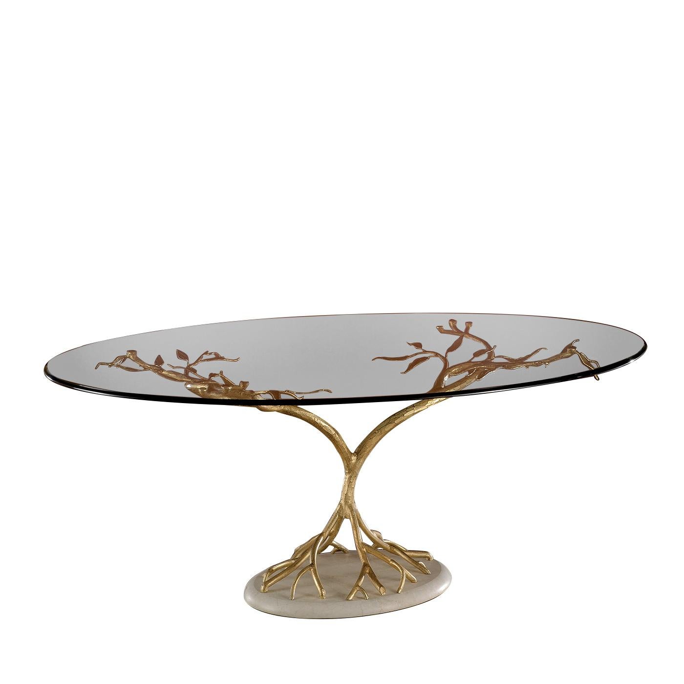 A magnificent piece of functional decor, this table will make a statement in any room, thanks to its superb craftsmanship. The use of high-quality materials and its whimsical design capture the majesty of nature with all its dynamic force. From a