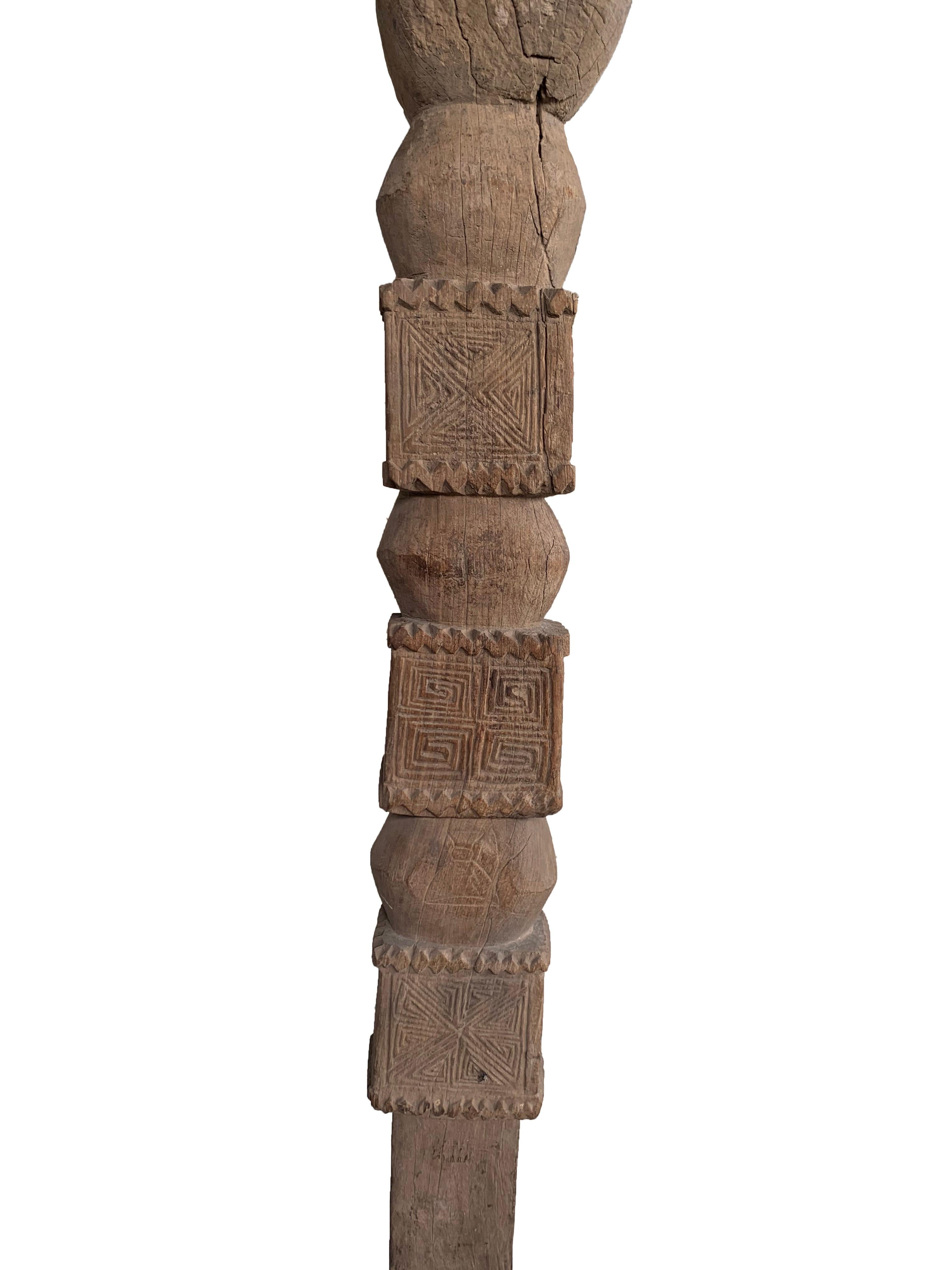 A tribal architectural column crafted from a single hardwood block from Nias Island, Indonesia. Nias is home to one of Indonesian most vibrant and warrior cultures. The present column bears distinct tribal patterns and would have once provided