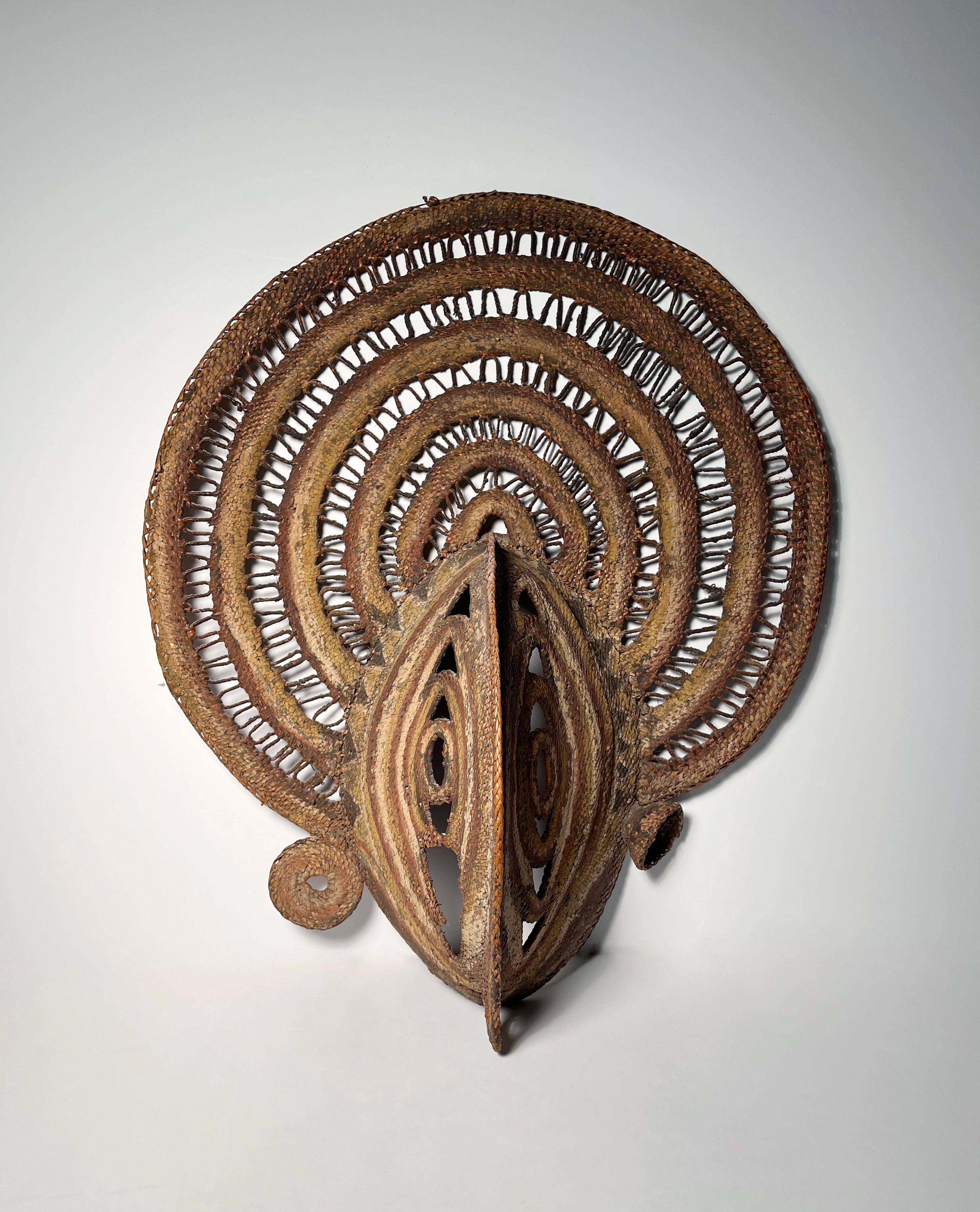 Large Tribal / Oceanic Polychrome Yam Mask from Papua New Guinea

A beautiful work of art to hang on the wall. Some minor small loss to the weaving lower right side of face. may desire to have that little piece restored.

Uncertain to exact age.