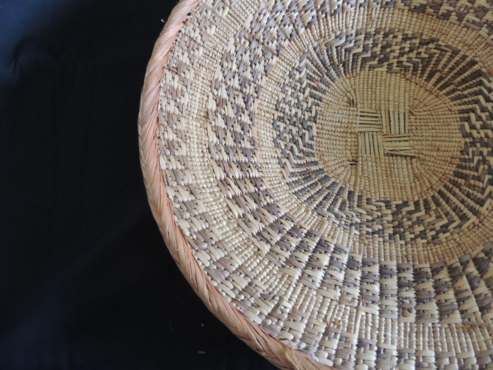 Vintage woven seagrass ethnic round African deep basket.
Artisanal handwoven basket with tribal designs and patterns all around.
(Is not flat is more like a deep bowl shape.)
Size: 15