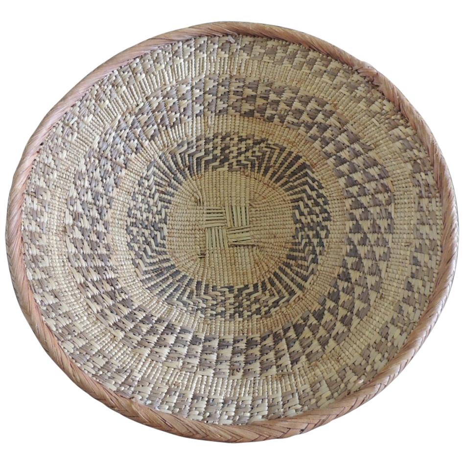 Large Tribal Round Woven Basket in Natural and Brown with Braided Rim