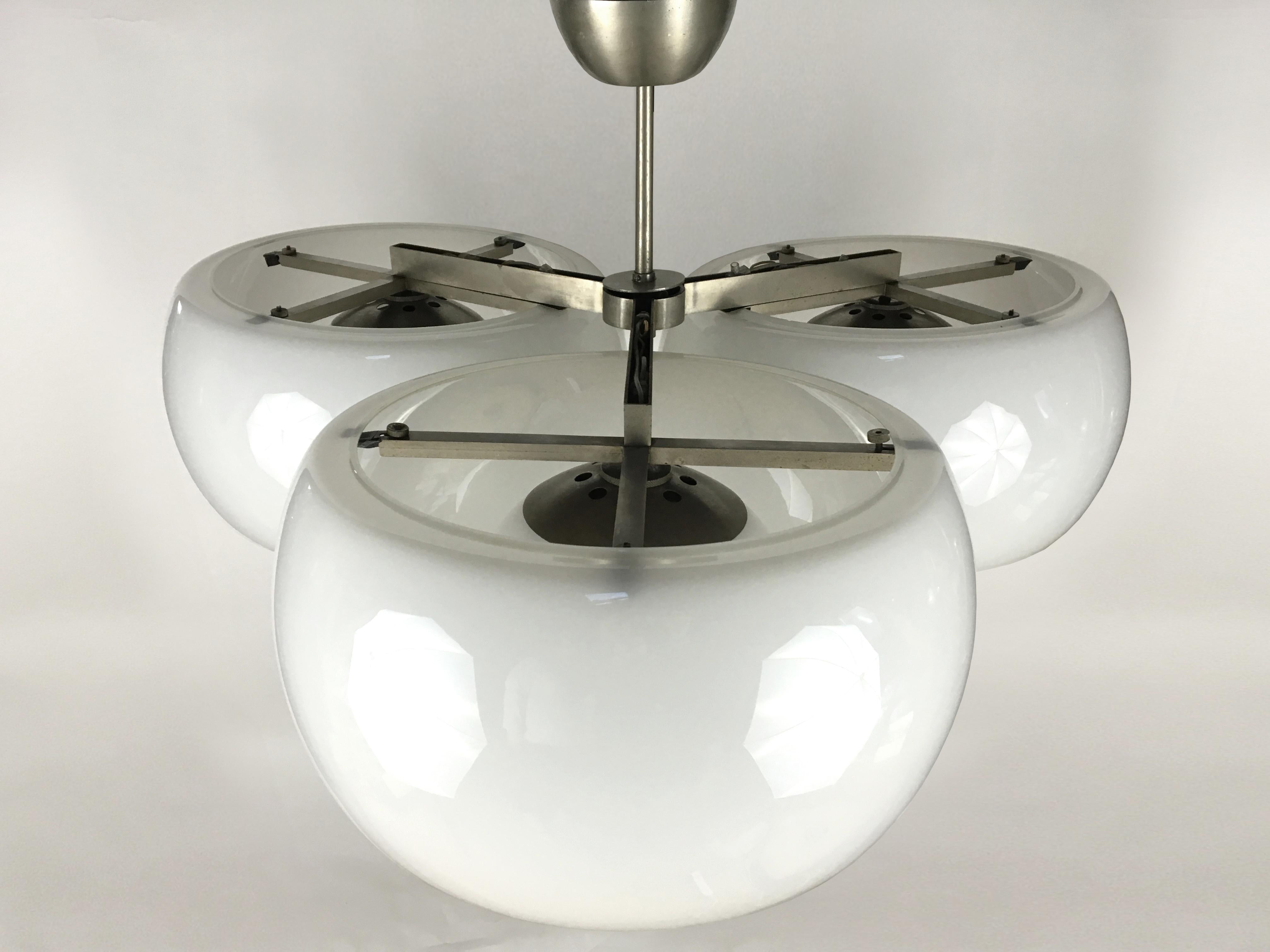 A rare three diffuser and globe fixture with white glass and brushed metal frame by Vico Magistretti for Artemide.

Italy, Circa 1961

