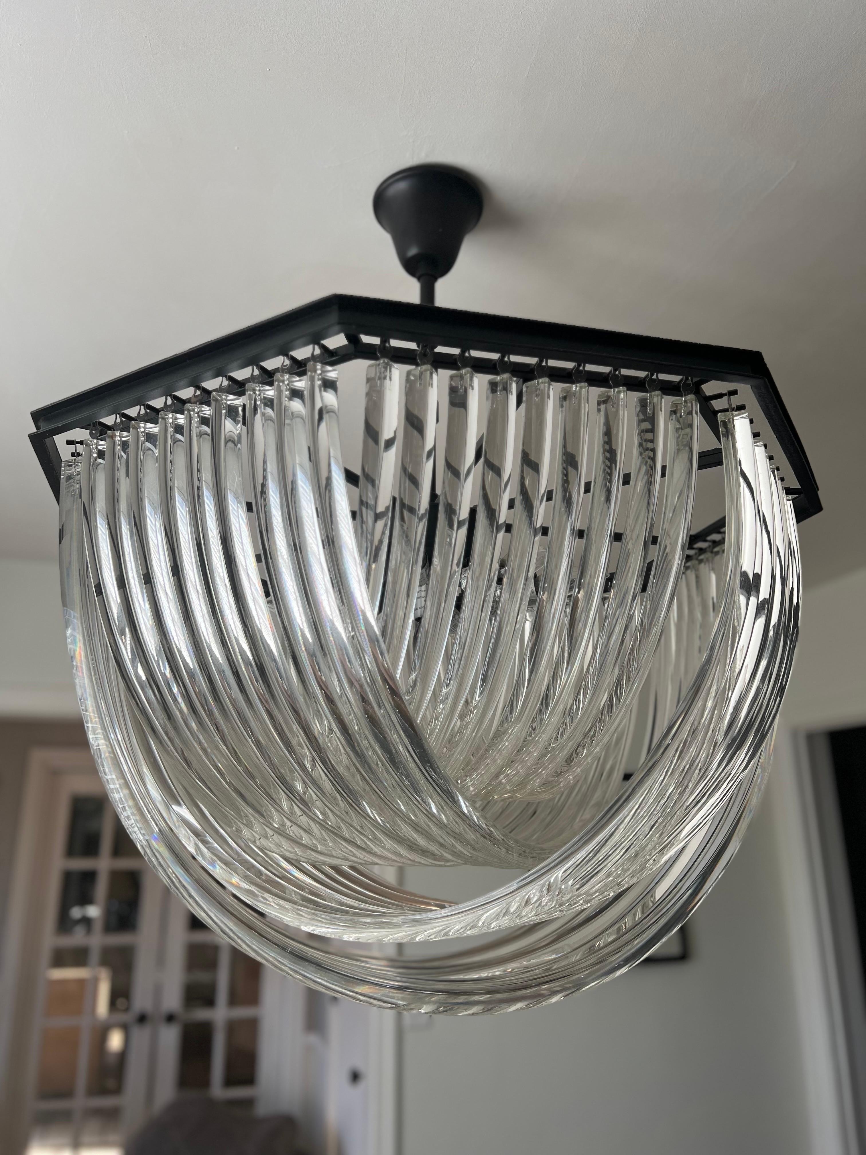 Stunning Mid Century Modern LARGE scale crossglass chandelier in the Italian inspired style of Triedri Venini.  Vintage discontinued for Restoration Hardware.

Each curved crystal rod is artfully shaped to create and overlapped effect.  Casting