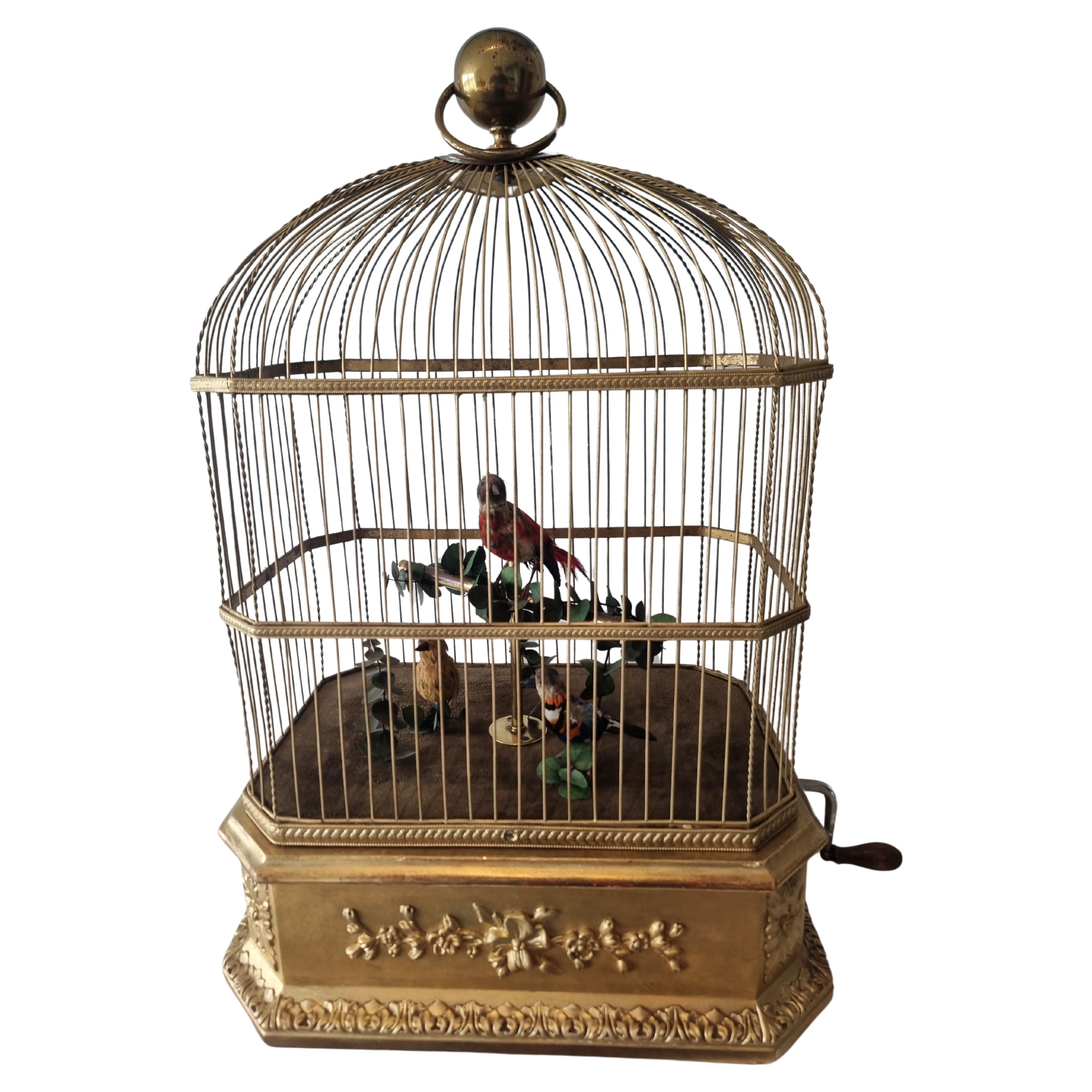 Large triple antique singing bird-in-cage, by Phallibois
