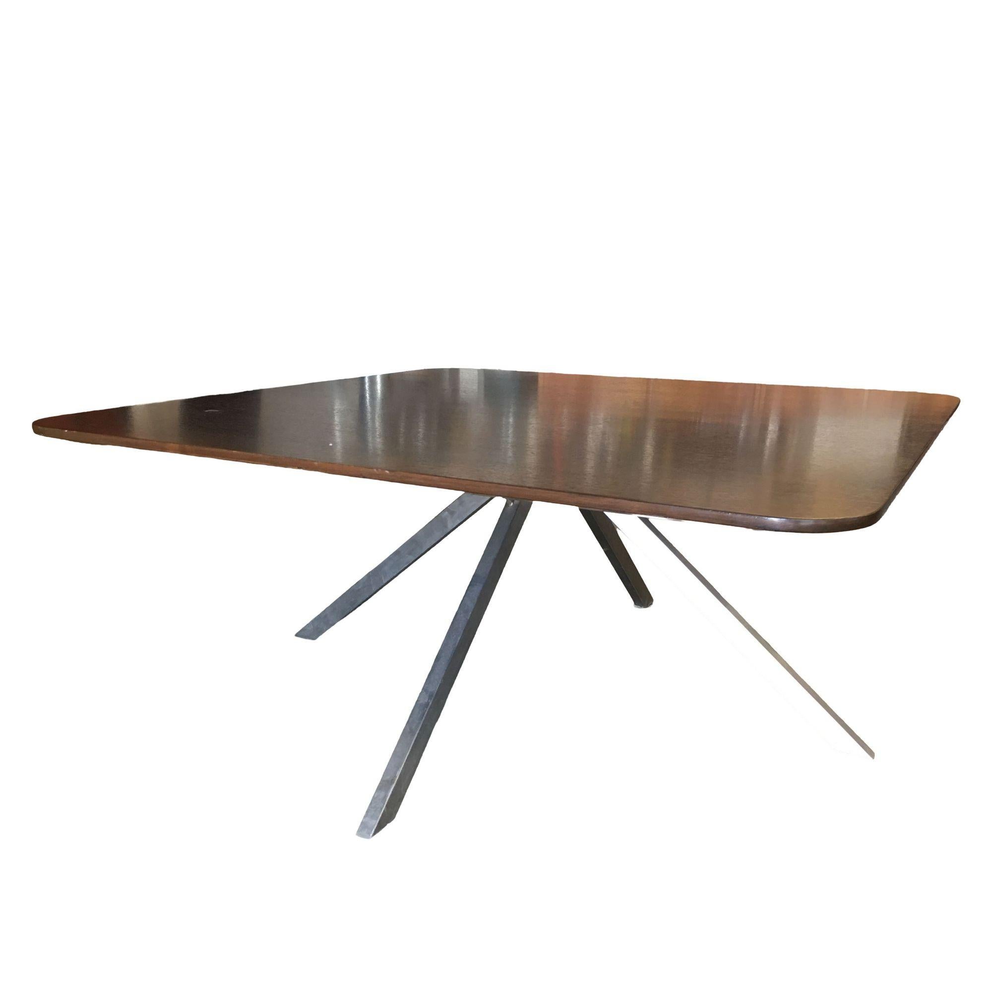 Large tripod leg coffee table featuring a dark stained oak top and a silver powder-coated 
