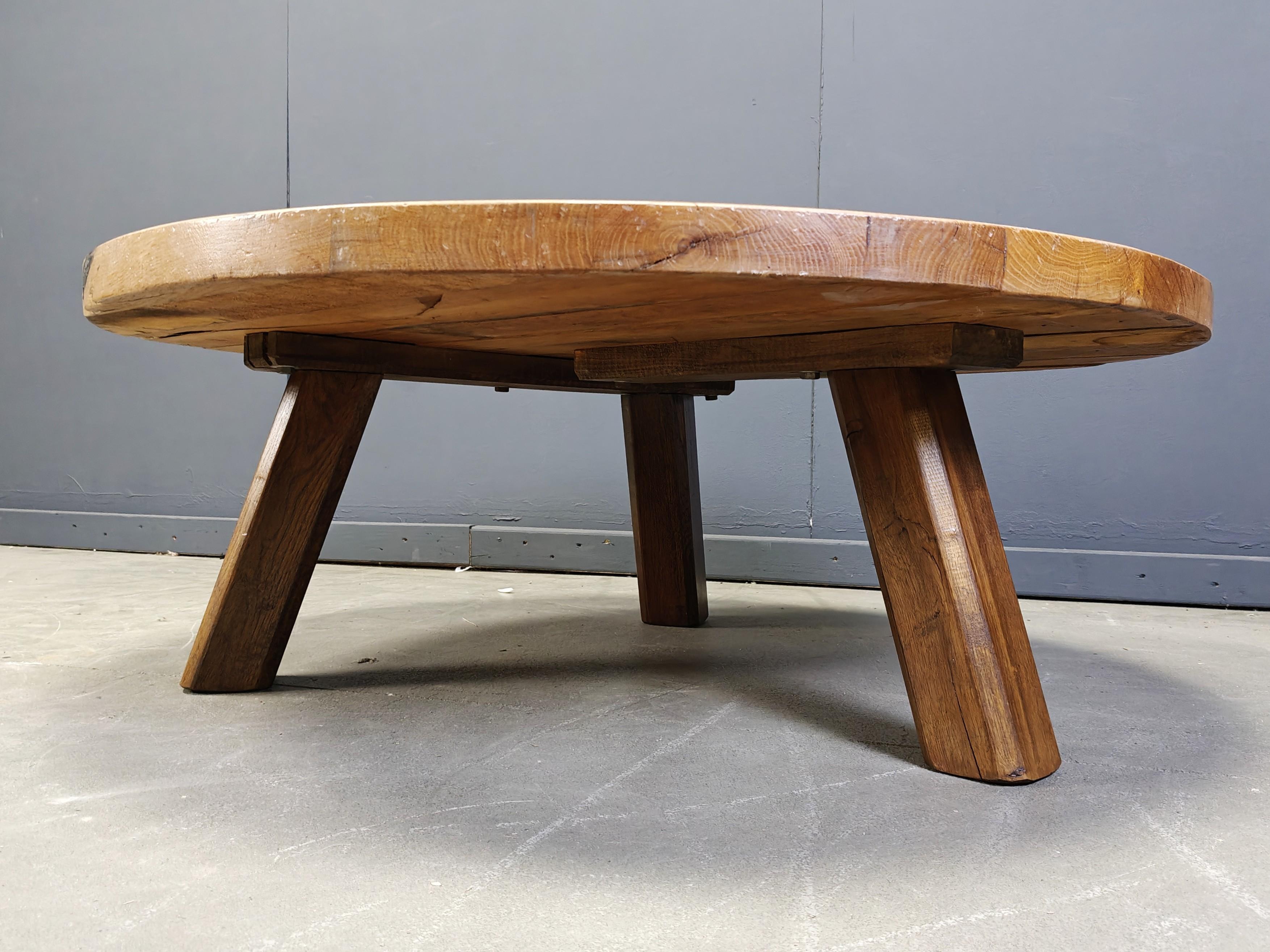 Rustic Large tripod round wooden brutalist coffee table, 1960s For Sale