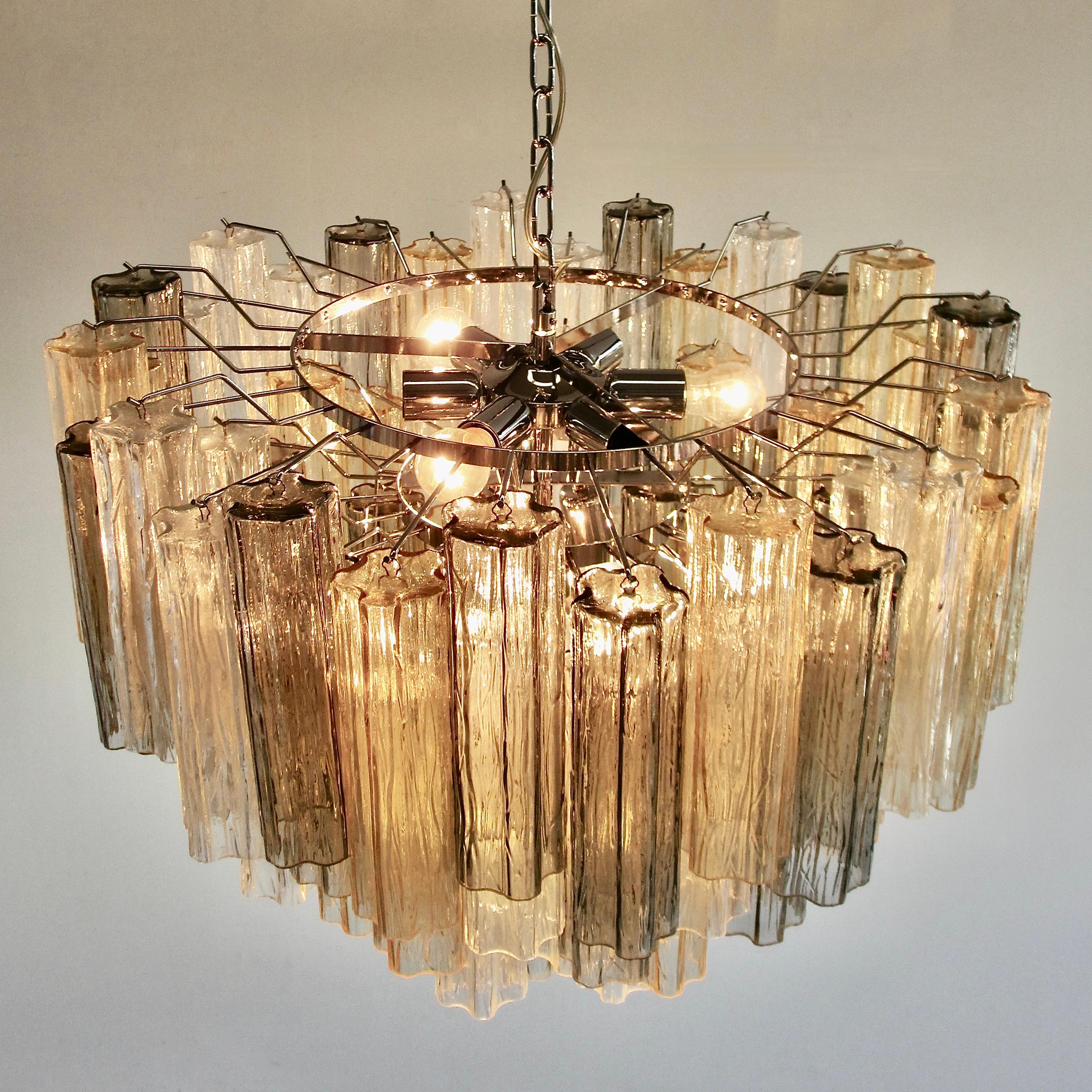 Chandelier with star-shaped 'Tronchi' glass pieces, Murano, Italy.

A large chandelier with chrome metal structure including well over 70 Murano amber, grey and clear coloured glass pieces. Arranged over several layers. Ten E27 light fittings. The