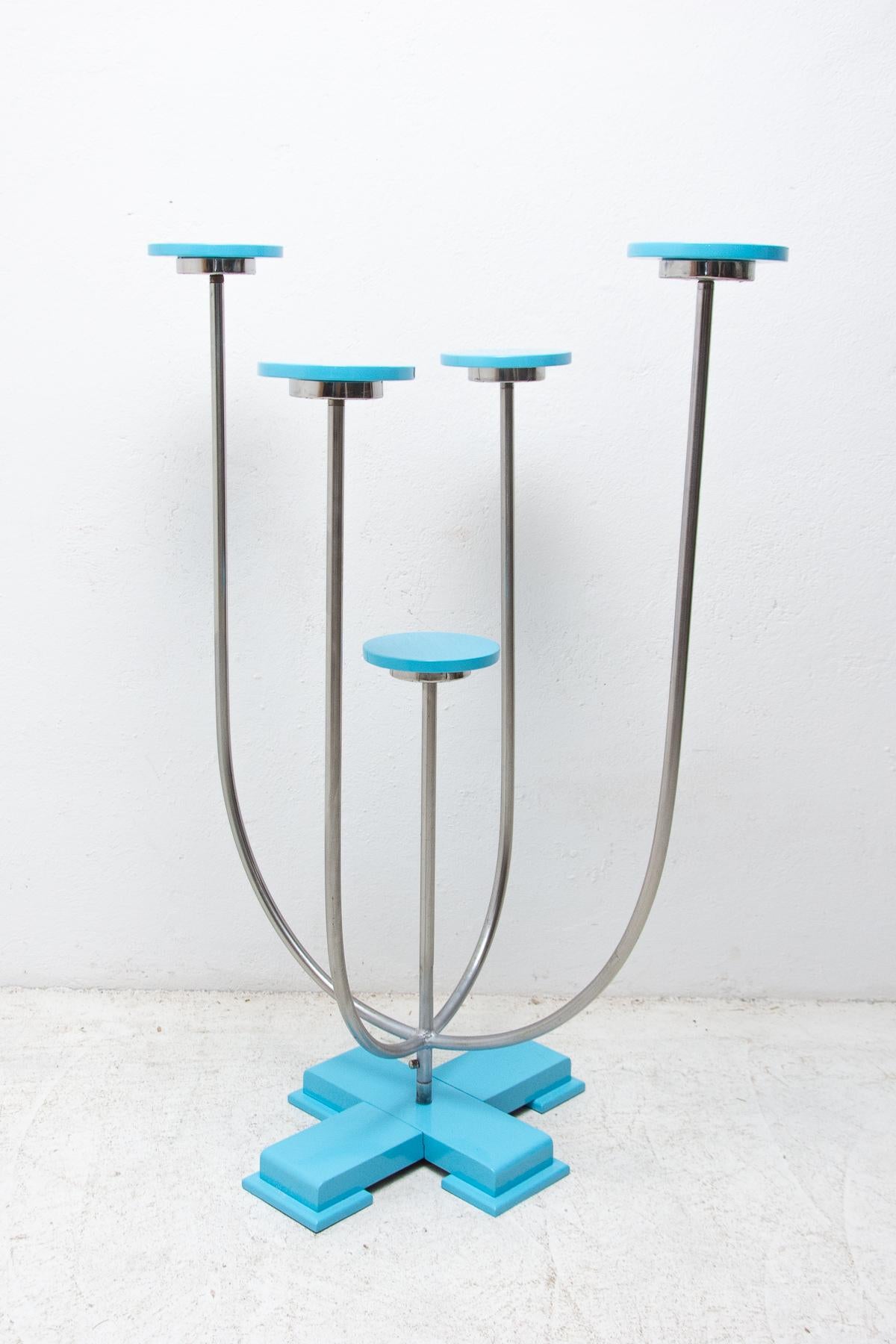 An example of Czechoslovak functionalism is this model of chrome- plated flower stand. The stand is made of bent tubes and wood. It was made in the former Czechoslovakia in the 1930´s. The stand is in excellent condition, the chrome has been