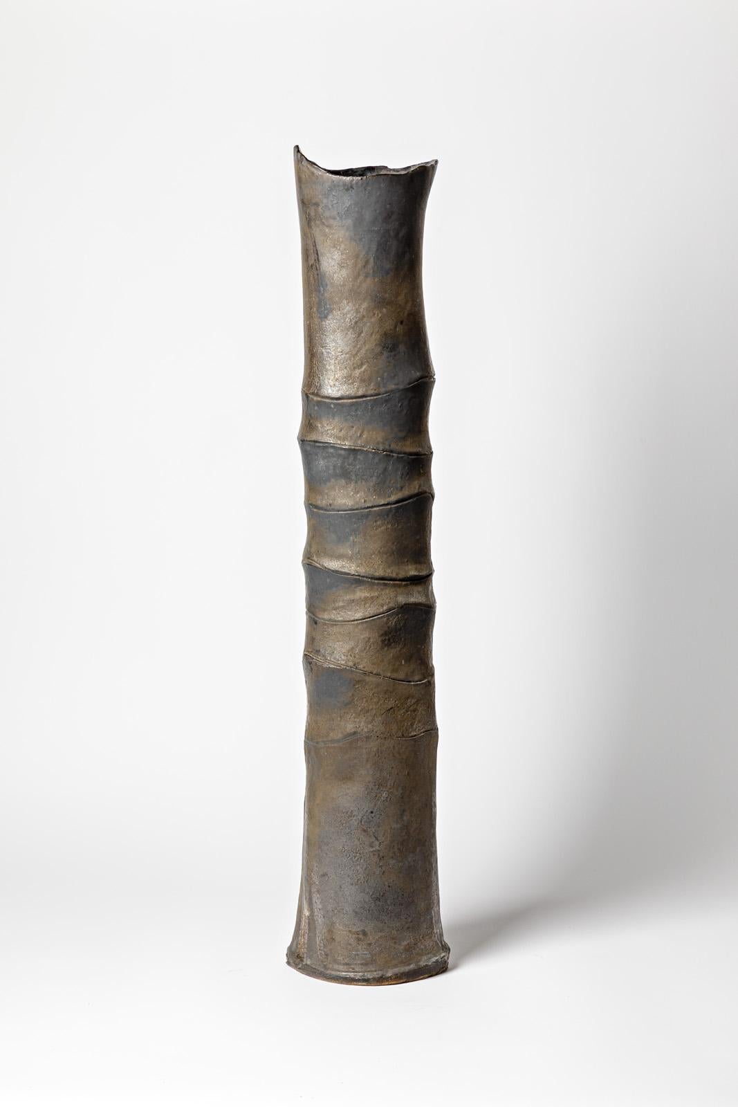 Large tubular vase « Bambou » in black glazed stoneware by Jean-Pierre Bonardot. 
Artist monogram under the base. Unique piece. Circa 1990.
H : 30.3’ X 6.3’ X 5.1’ inches.